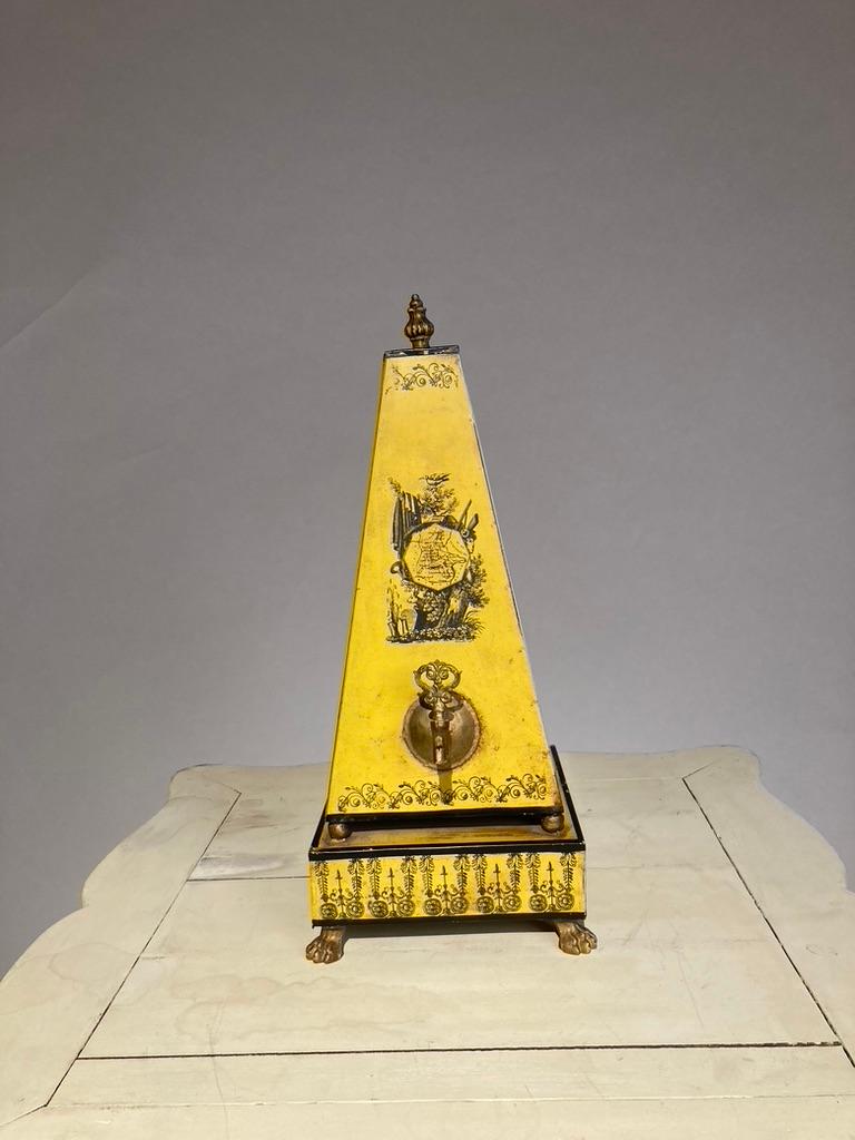 Empire Italian Yellow Tole Obelisk Urn With Paw Feet For Sale