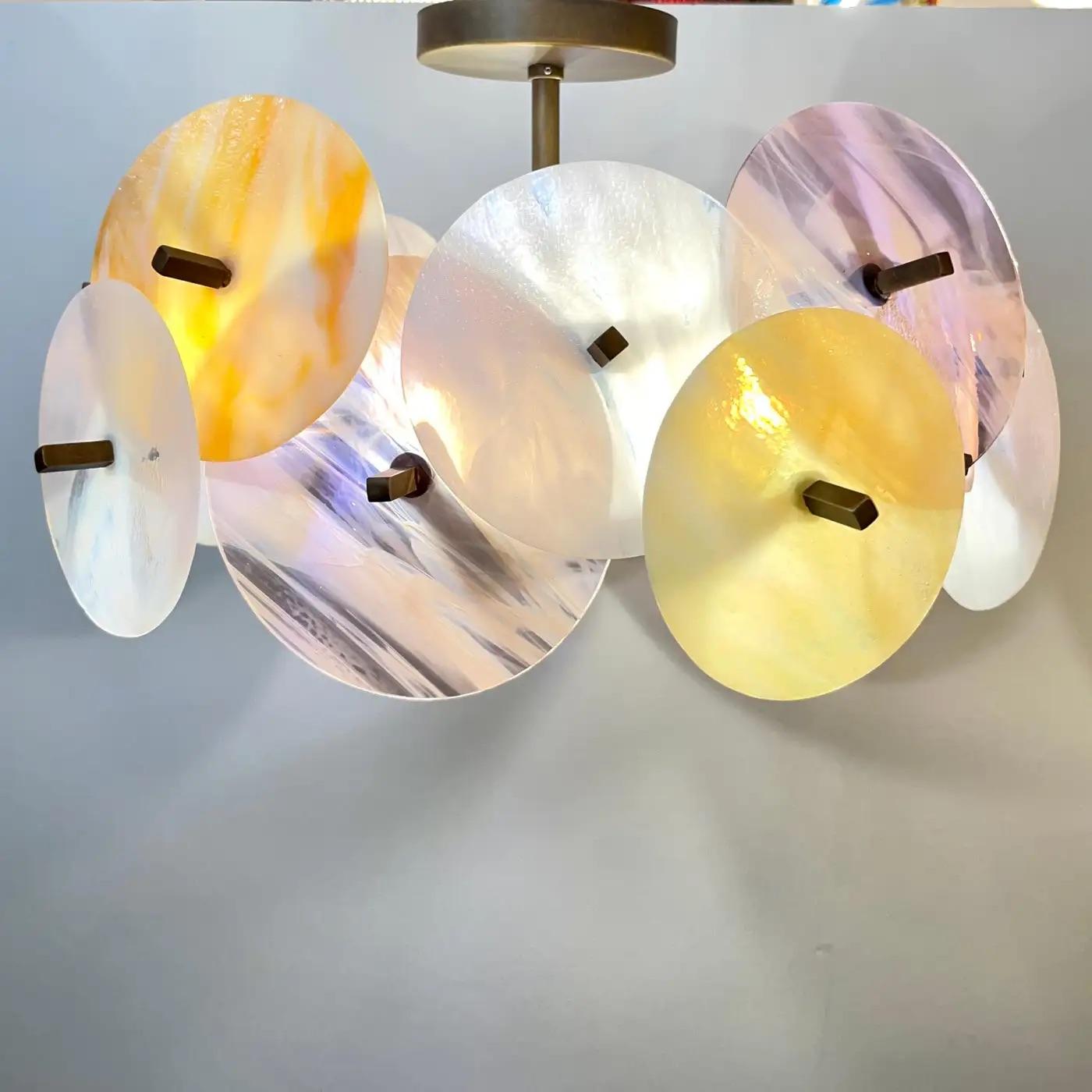 Ideal for low ceilings or above an opening door, the short height makes it a very functional and rare solution, this small chandelier is a little jewel, entirely customizable in colors, sizes and finishes. This is a contemporary Italian exclusive