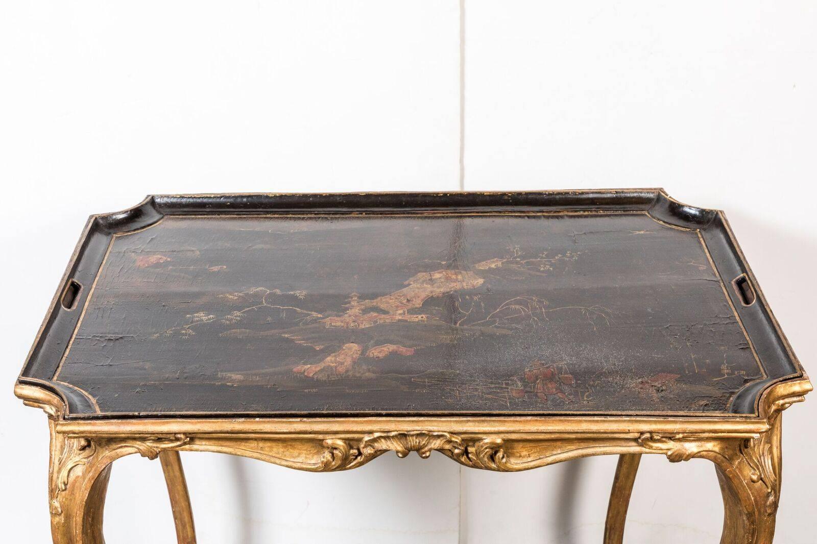 Completely original, cabriole leg, concave-corner hand-carved and gilded tray table with removable inset, lacquered and painted chinoiserie serving tray.