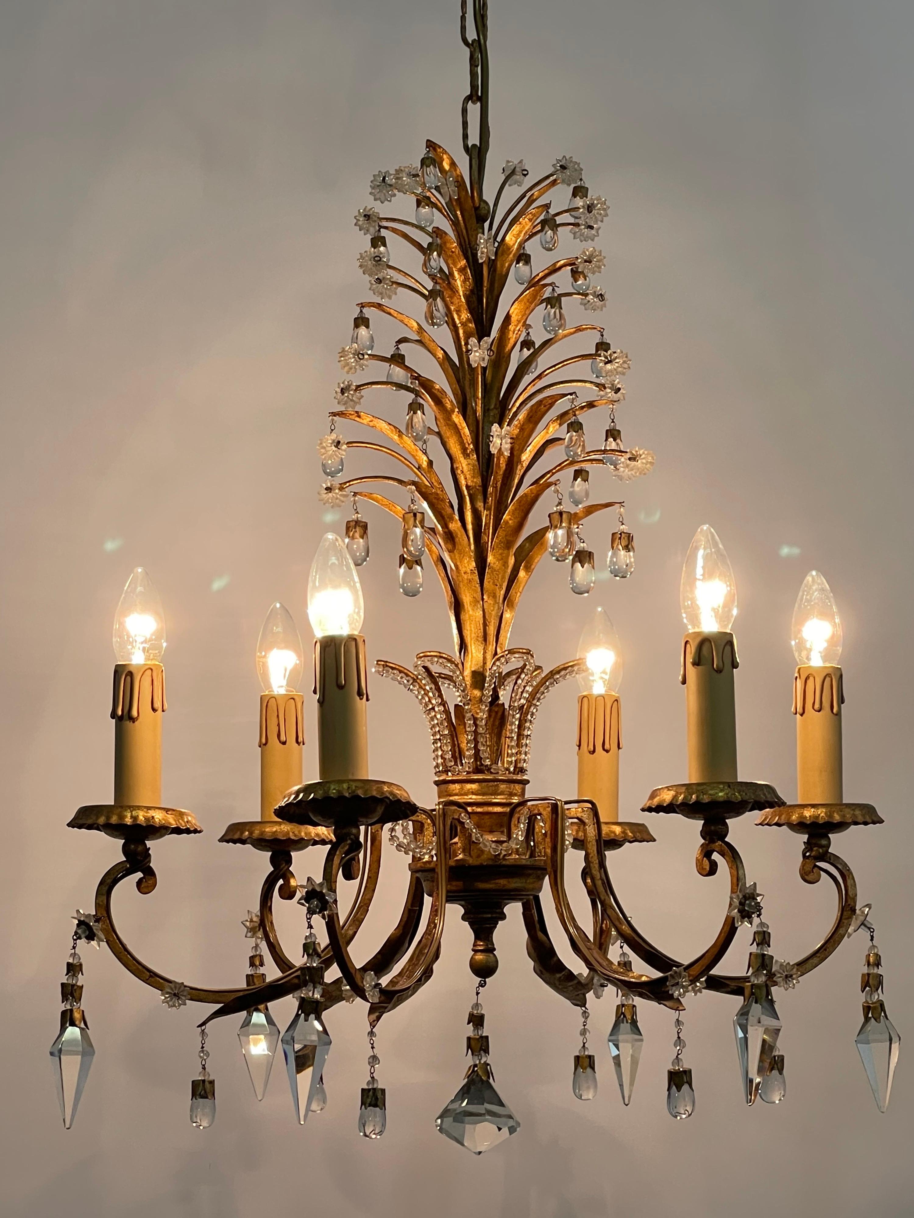 Late 20th Century Italian Gilt Iron and Lead Crystal Chandelier by G.Banci,  circa 1970s For Sale