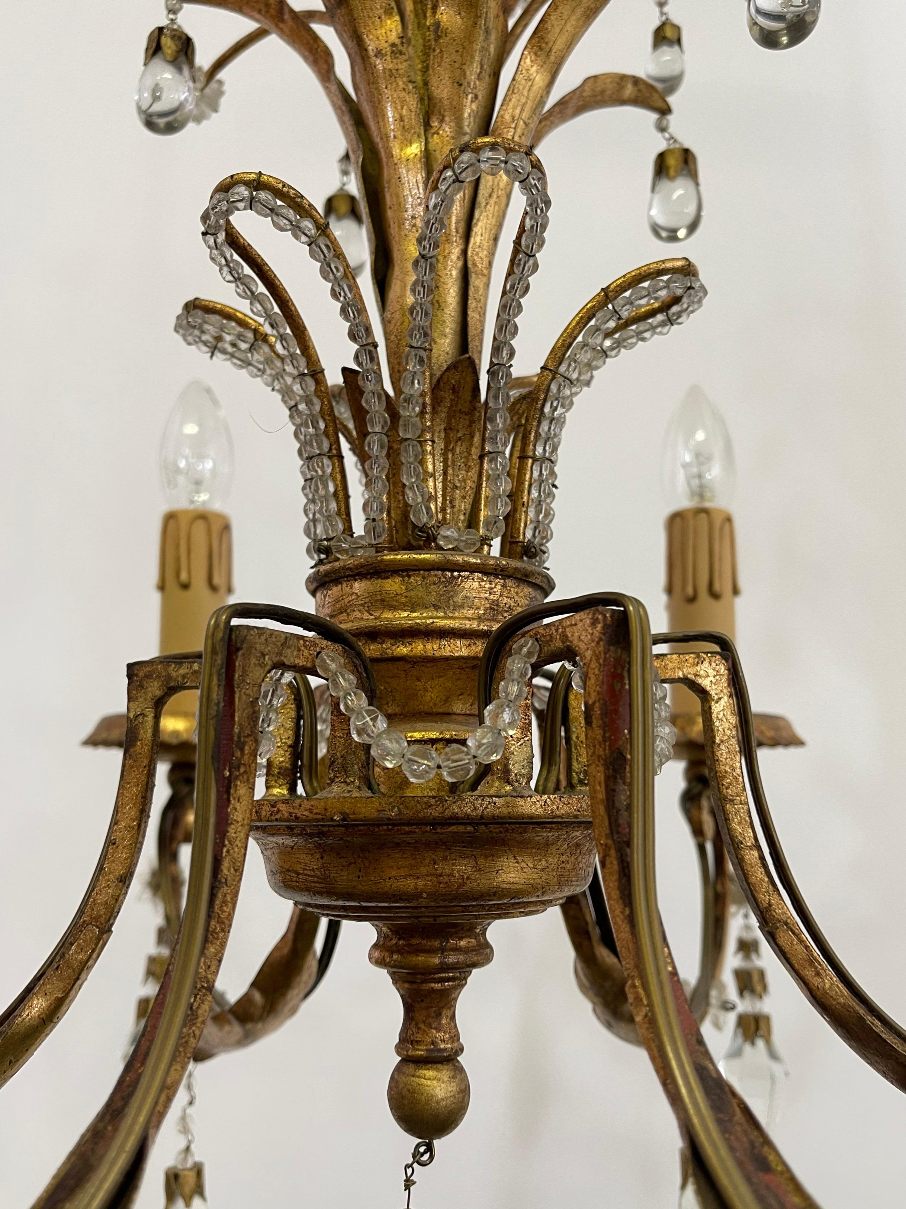 Fer Lustre italien en fer doré et cristal au plomb de G. Banci  vers les années 1970 en vente