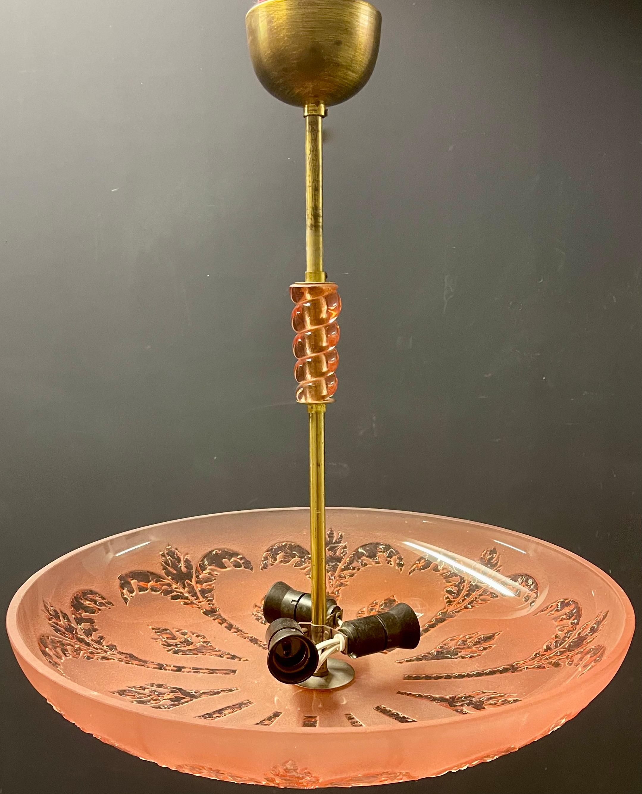 wonderful ceiling lamp from italy with hand carved decoration.
