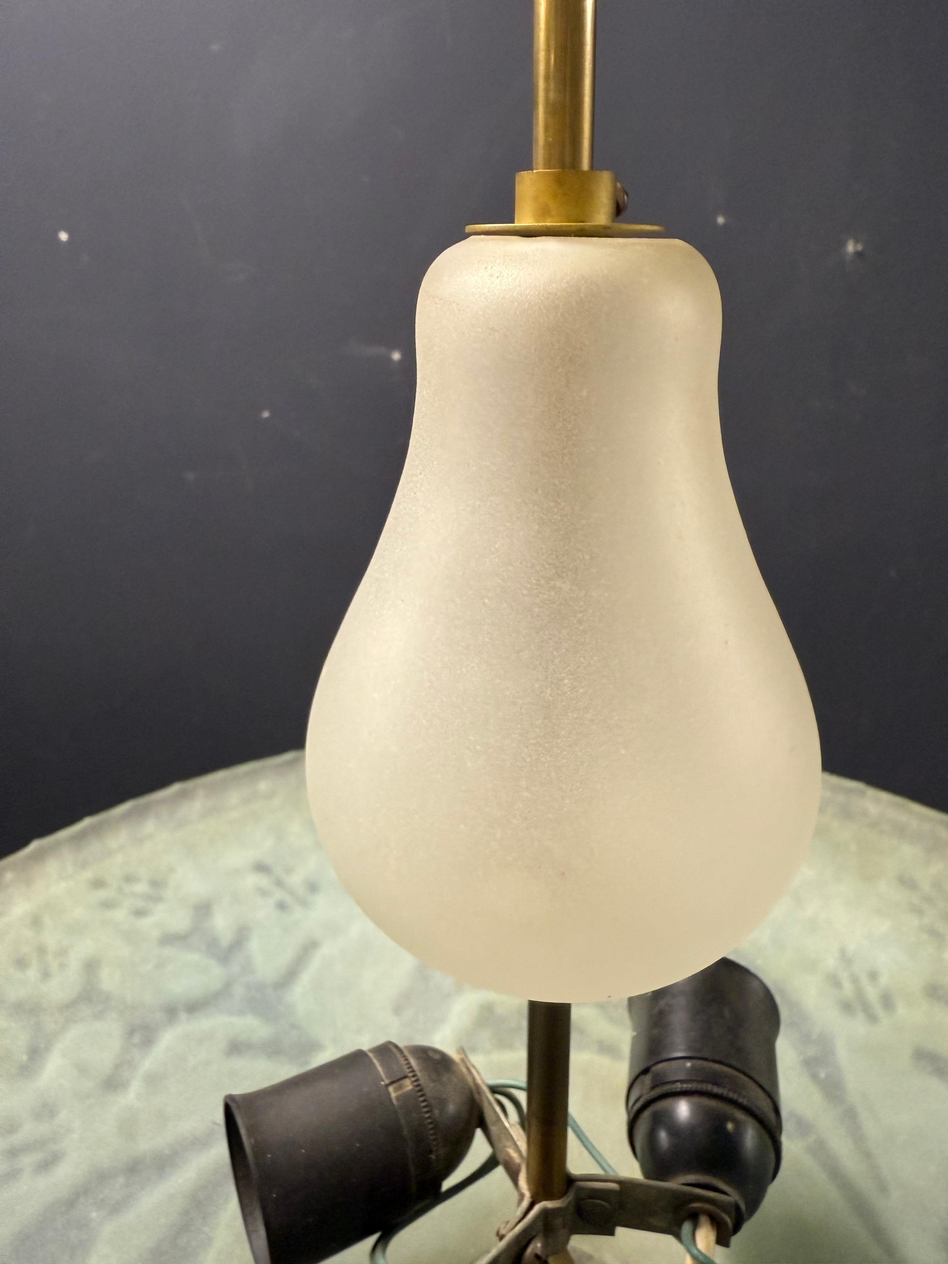 nice ceiling lamp with carved, sanded and engraved details. the glass decoration on the brass bar can be high adjusted.