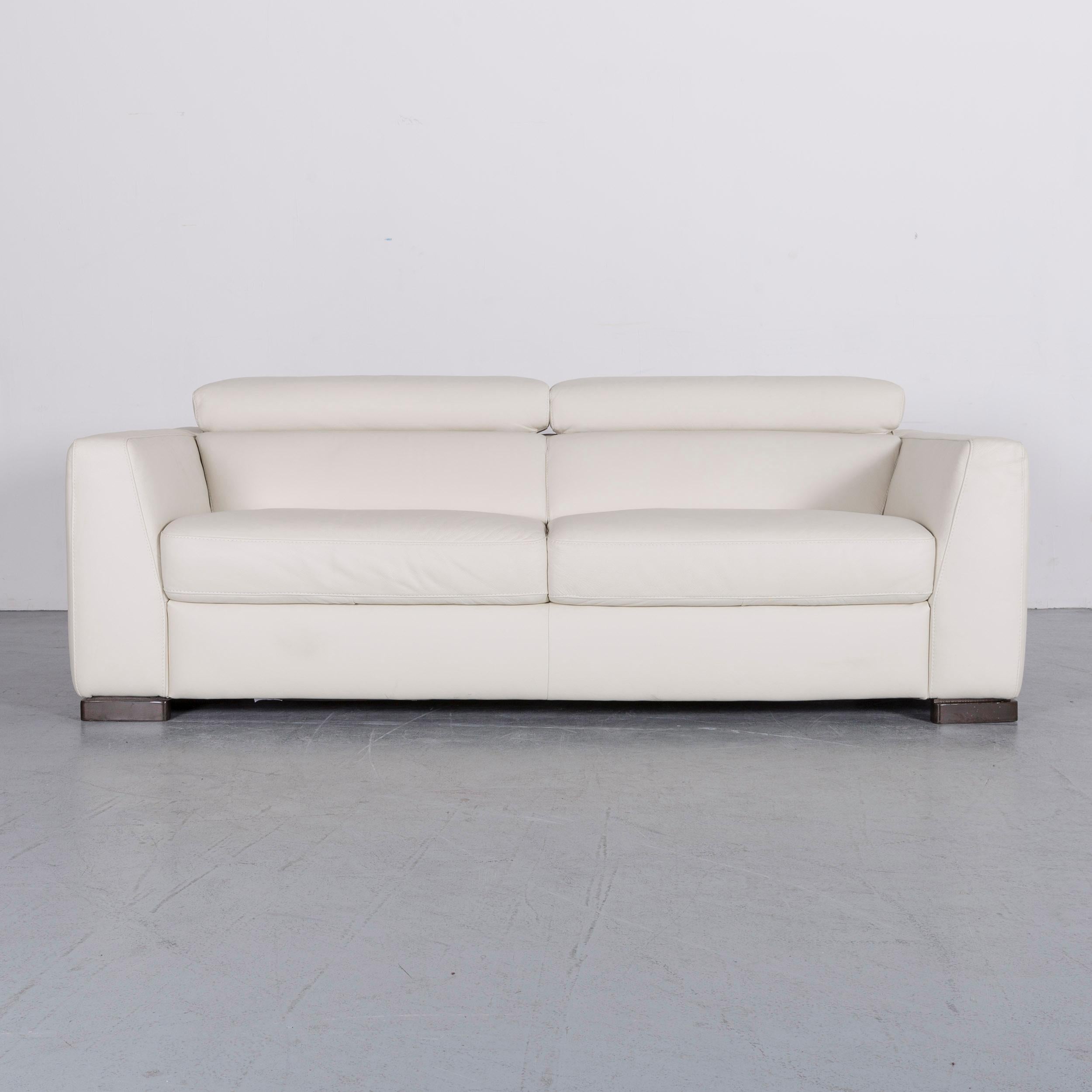 We bring to you an Italsofa designer leather sofa crème white modern three-seat couch.