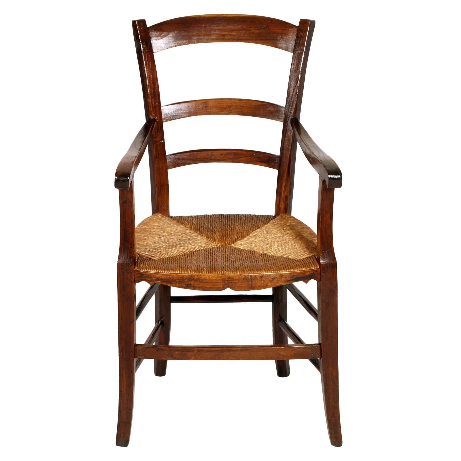 Italian 18th century country rustic robust armchair in chestnut wood hand cut, restored and polished with shellac and wax. Straw seat in excellent condition
Measures cm: H 102\48 x W 54 x D 51.