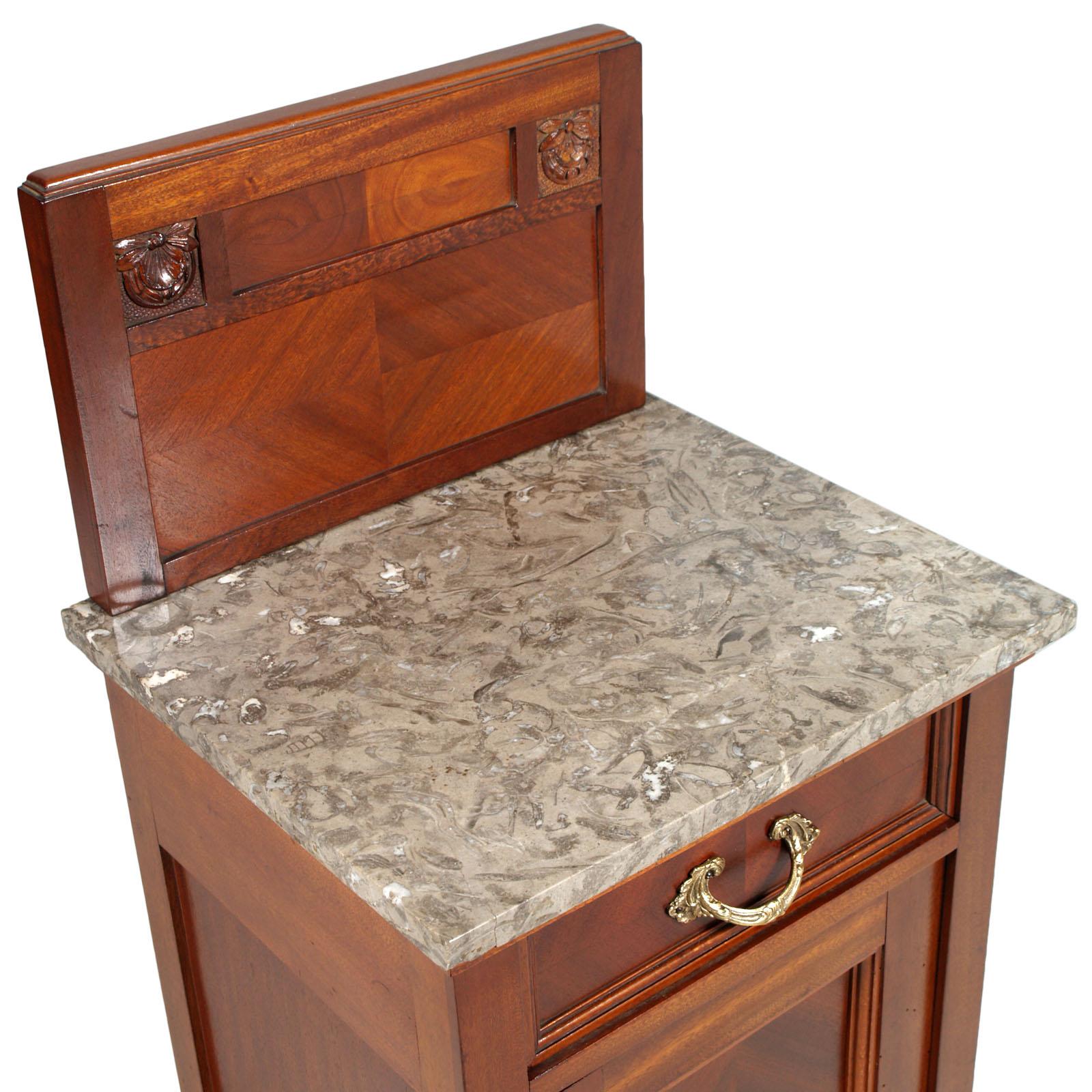 Early 20th century Italian Art Nouveau bedside table, nightstand in mahogany, marble top, restored polished with wax.
Measures cm: H 110\83, W 45, D 40.