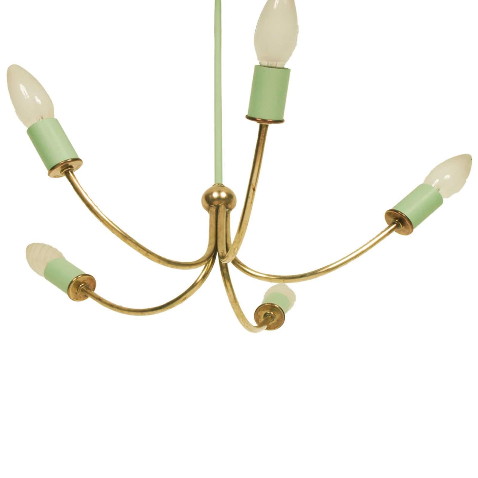 Art Deco pendant lamp, gilded brass and green painted brass with five arms. Minimalist design. Electrical system redone and functional, ready for use.


Measure in cm. Height 80, diameter 45.
