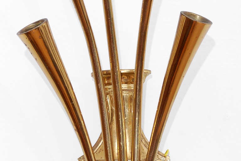 Italian Wall Sconce attributed to the design of Guglielmo Ulrich Italy 1950s
Five lights. Constructed in Solid Brass.
Unmarked.
Requires five 40-watt torpedo shape bulbs- not included. 
6.5W × 6D × 20L
Presents with elegance and sophistication.