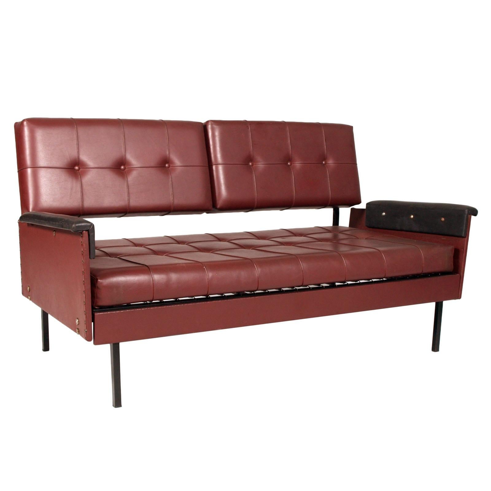 They can be sold separately

Italy 1960s Cubist armchairs and sofa, iron legs, faux leather quilted upholstery.
Structure and legs in painted steel, all removable pillows. The sofa can become a bed by widening the armrests and using the two
