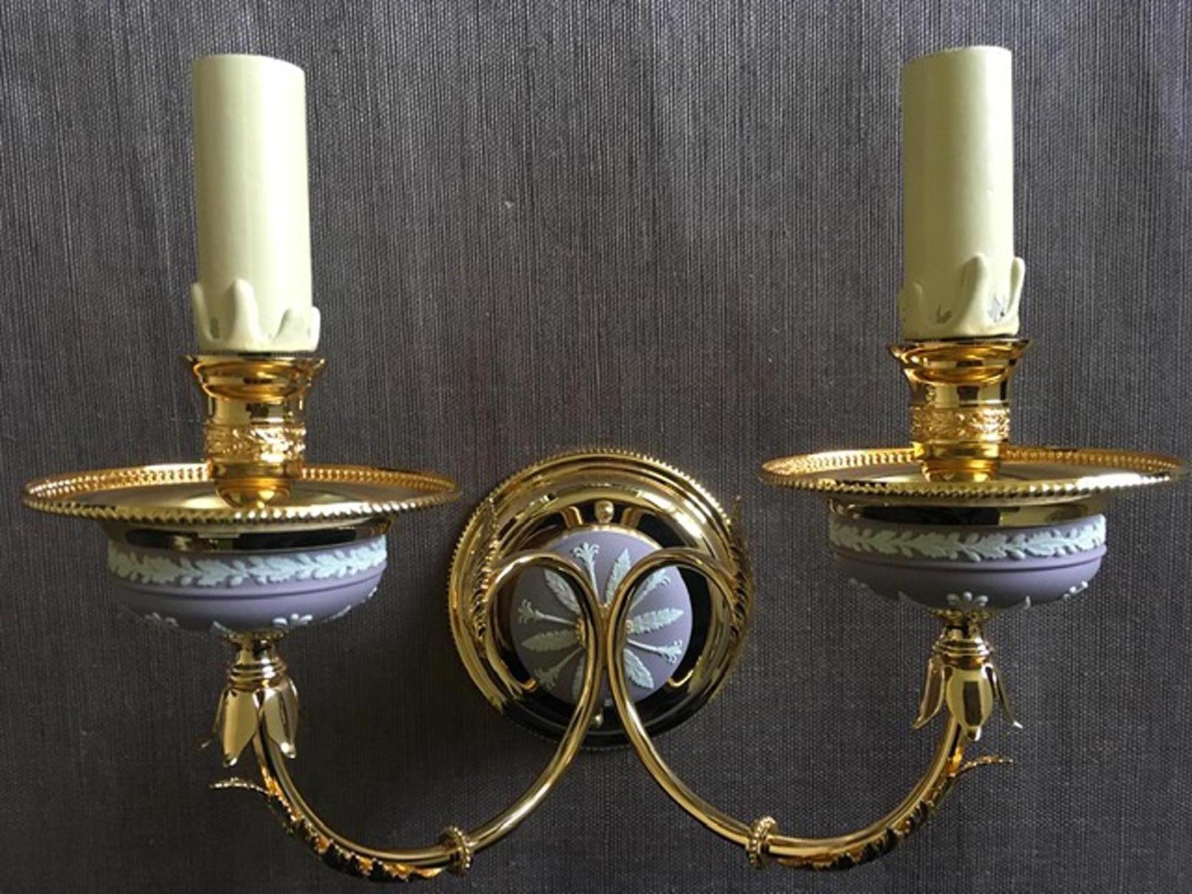 This elegant and glamorous two lights wall light in Pink Lilac color, it is part of the latest pieces manufactured by a well known Italian factory during the 1970’ and then left  in stock until today. The Greek and Roman scenes have been applied by