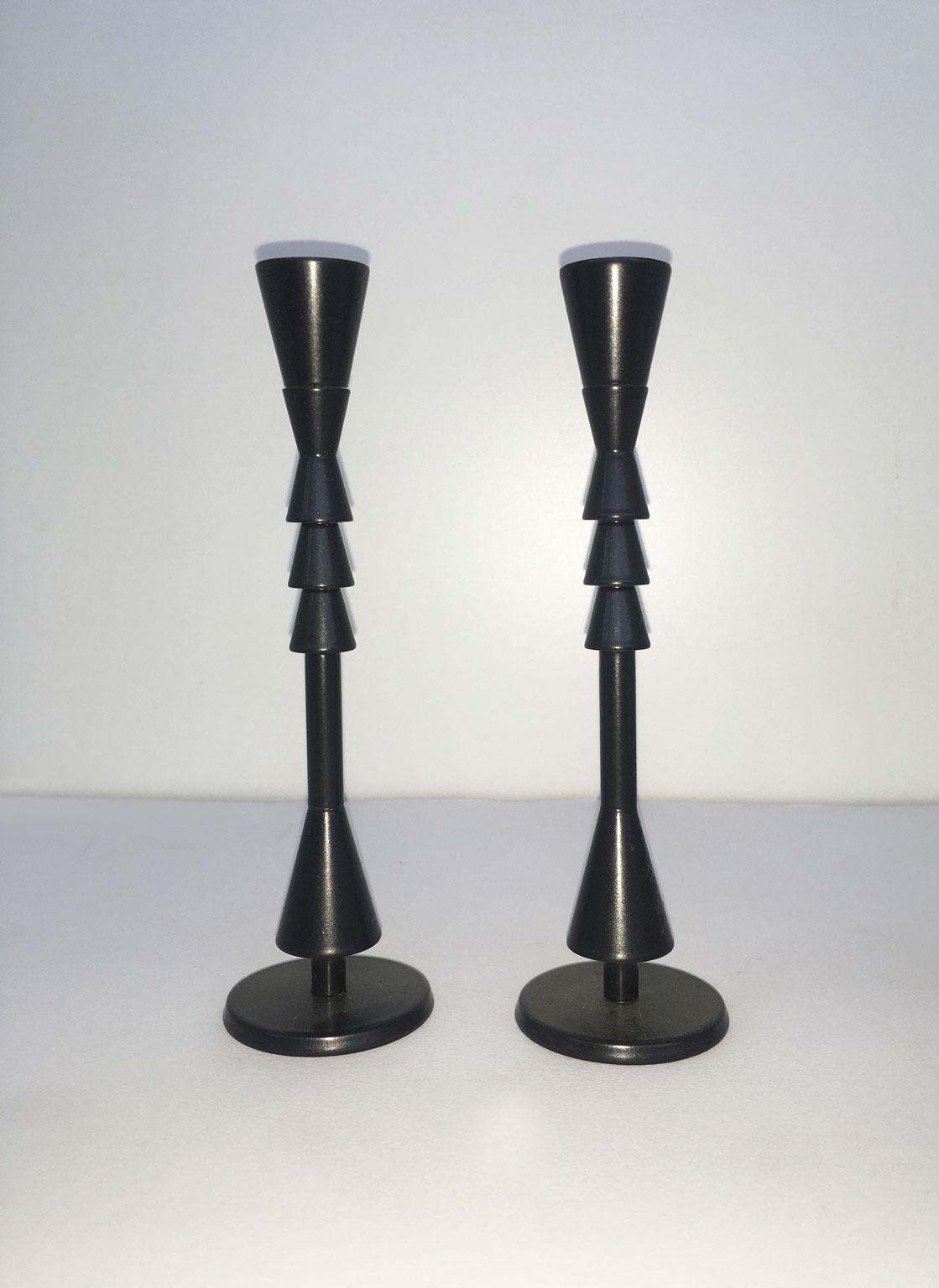 This artwork is a multiples limited not numbered specimens created by the Italian artist Ugo La Pietra, a well known Internationally artist. The pieces are useful as candleholders.

Ugo La Pietra was born in Bussi Sul Tirino (Italy) in 1938.
