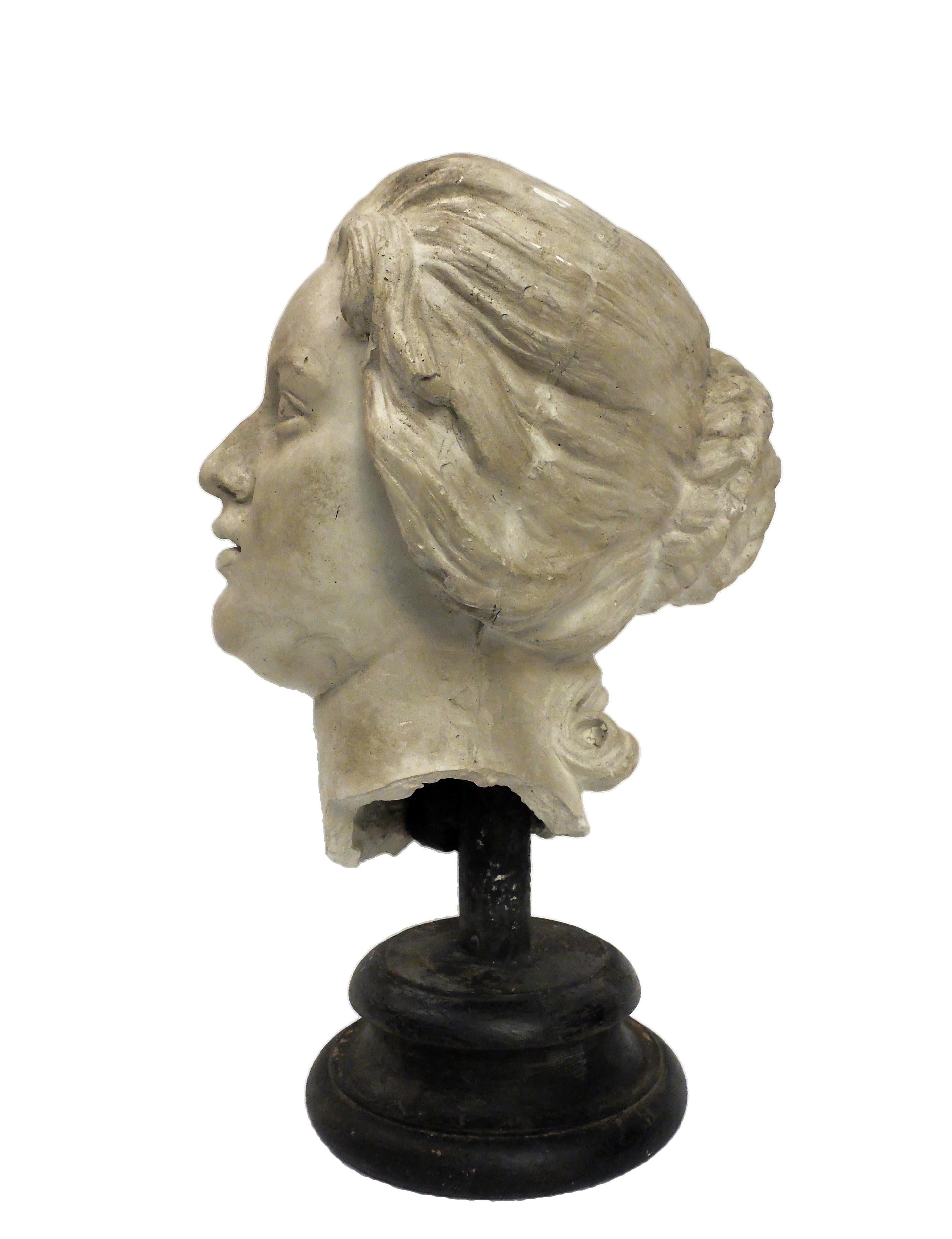 Over the wooden black painted base is set the superb cast of Costanza Bonarelli head. Cast for drawing teaching in academy, Italy, circa 1890