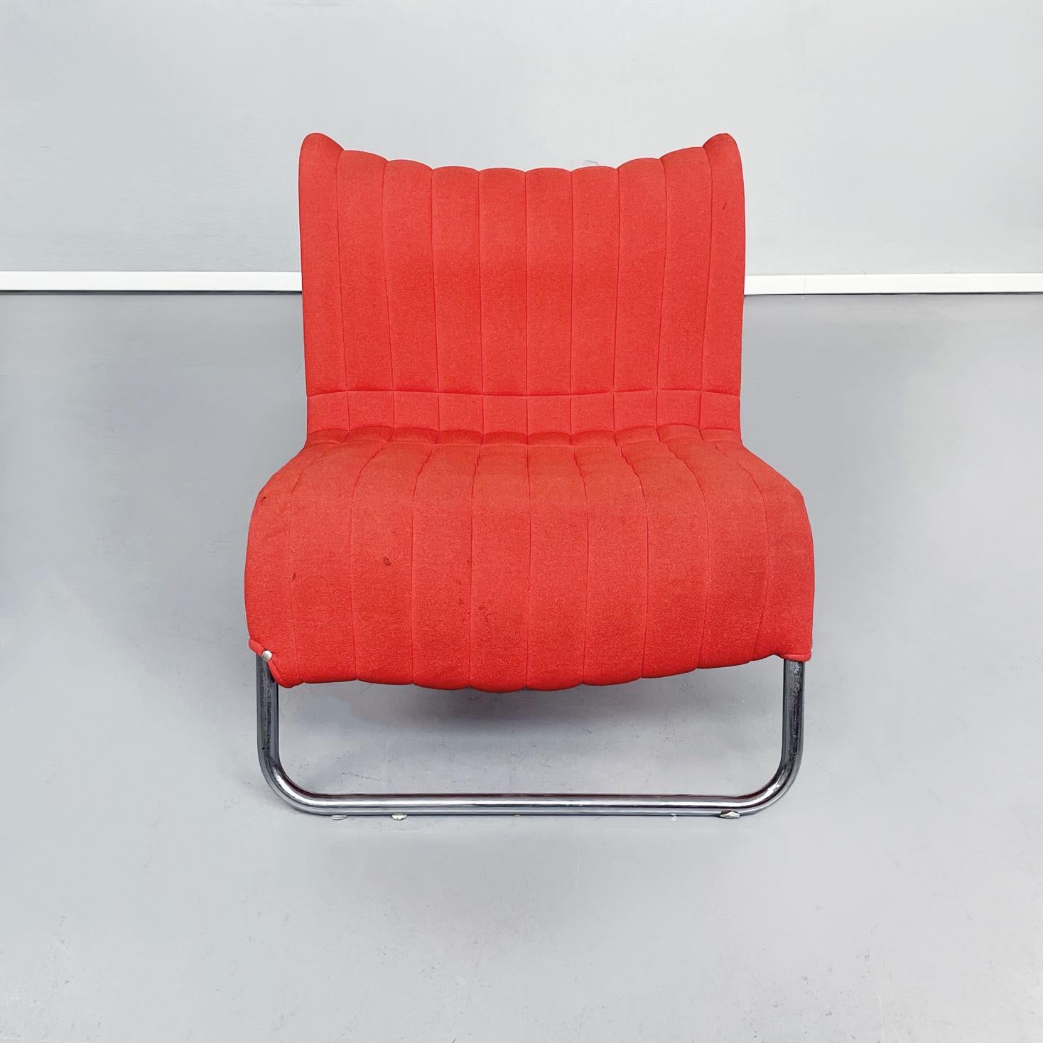 Italian Armchair and footrest Due Cavalli by De Pas, D’Urbino and Lomazzi for Driade, 1970s
A set of an armchair and a footstool model Due Cavalli, padded and upholstered in red fabric. The structure of the pouf and of the armchair is in tubular