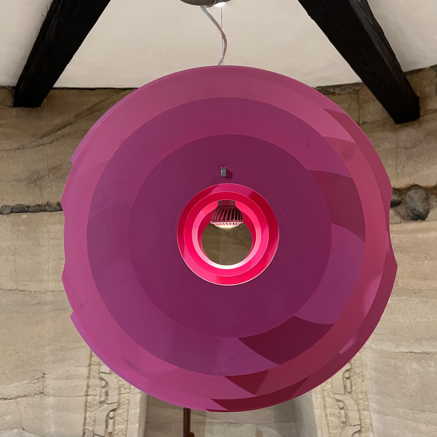 Supernova Suspension lamp by architect designer Ferruccio Laviani for Foscarini Made in Italy
Light provides diffused illuminance in all directions
22.5 w x 20 d x 32.5 tall
Fabulous Colors of Fuchsia Pink
Coated Aluminum layered Metal
Preowned
