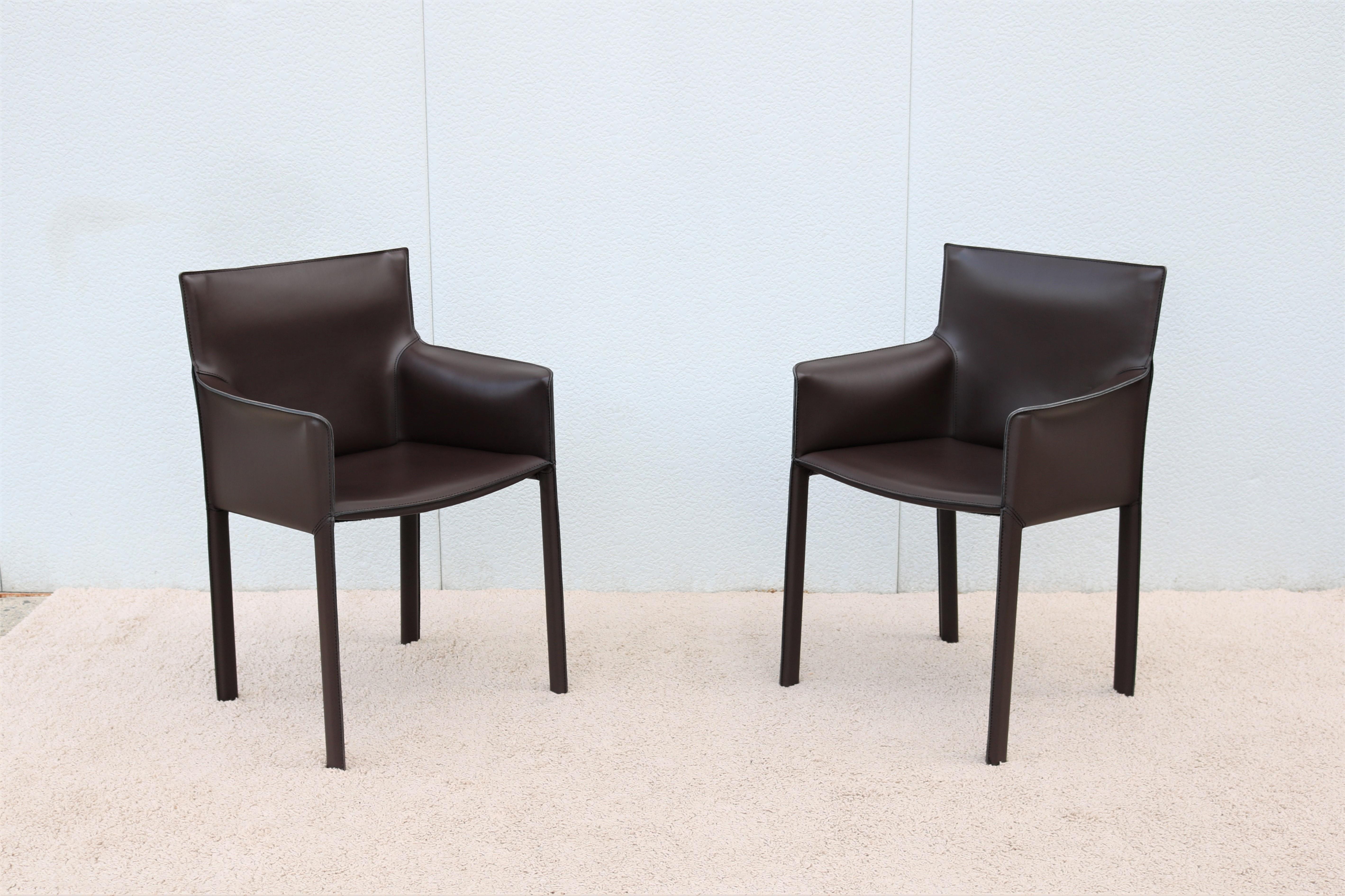 Gorgeous pair of Enrico Pellizzoni Pasqualina armchairs designed by Grassi & Bianchi. The chairs were manufactured in 2014 and are meticulously maintained.
This elegant chair essentially consists of two elements that are completely distinct,
A