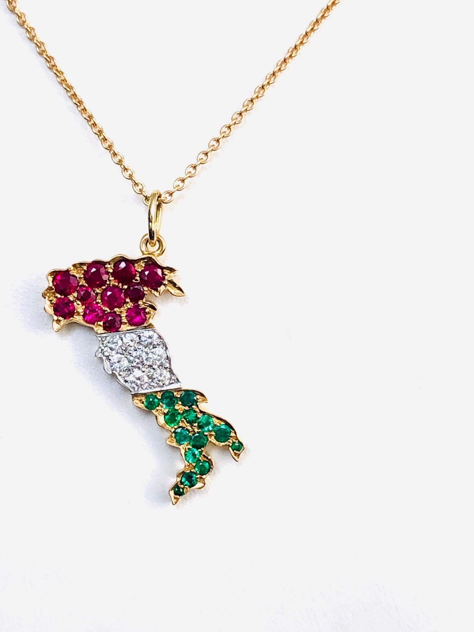 Beautiful map of Italy Pendant/Necklace, created in 18Kt Yellow Gold and Platinum, set with 11 Rubies 1.02 carats, 8 diamonds 0.28 carats, 14 emeralds 0.53 carats. Pendant length is 1-1/2 inches(4.0 cm).

We manufacture all of our jewelry, in our