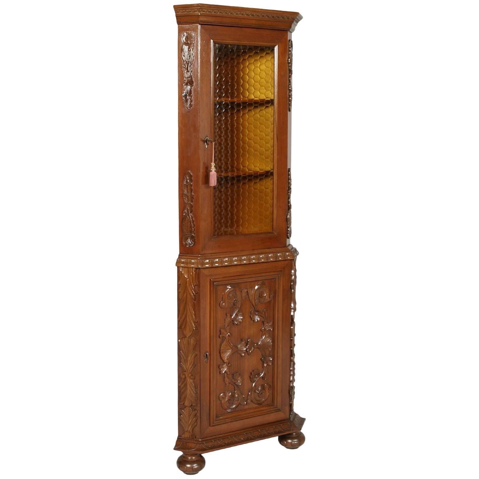 Italy cupboard Renaissance style by Michele Bonciani in hand-carved walnut, polished to wax, circa 1930s.
Measures cm: H 190, W 64, D 45.