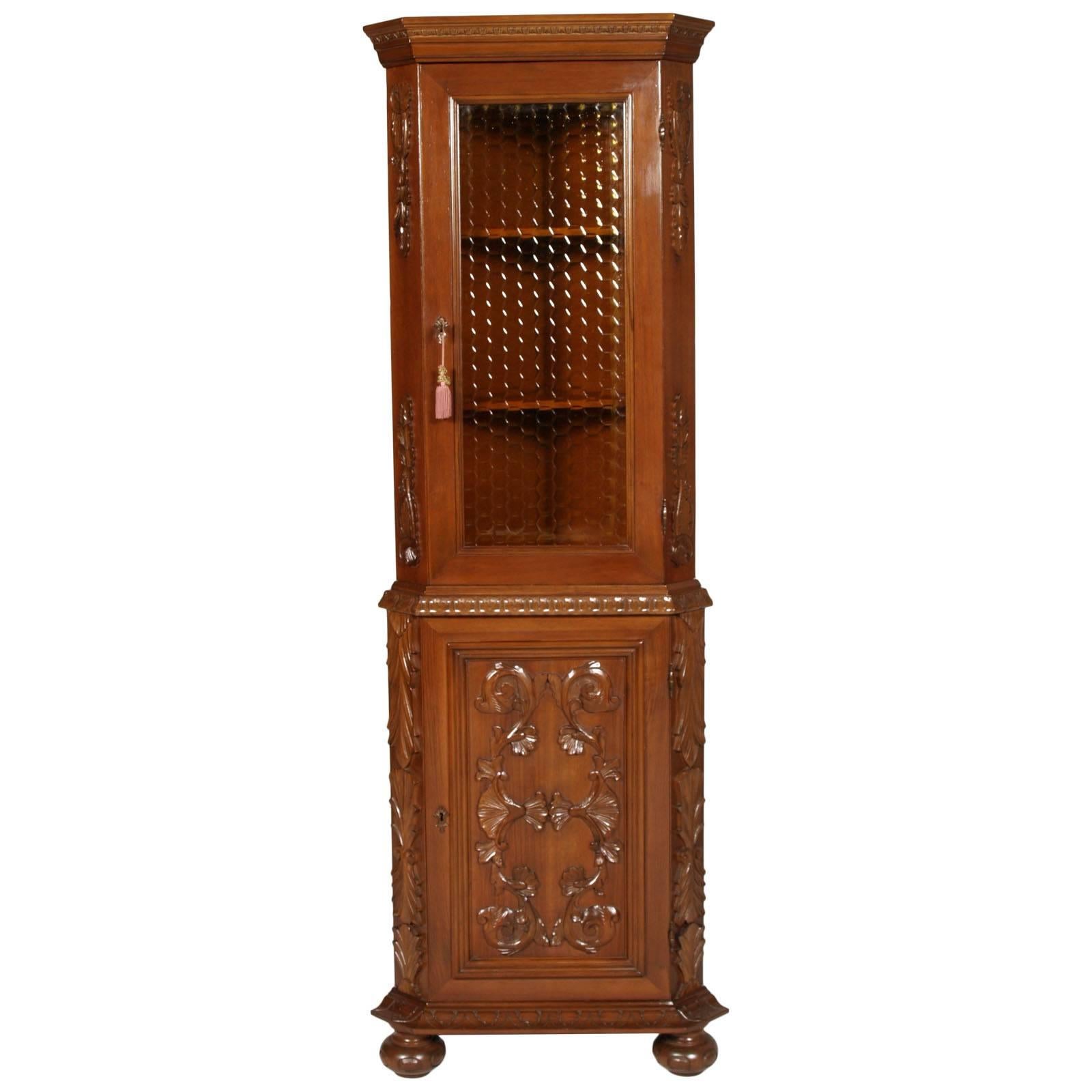 Italy antique Corner Cupboard Renaissance by Michele Bonciani in Carved Walnut For Sale