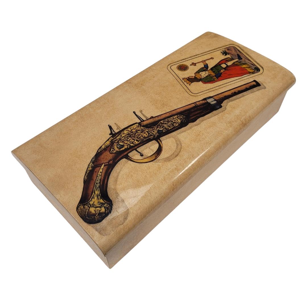  Spectacular and unique box is a work by renowned Italian designer Aldo Tura, made of parchment (goatskin) in mid-century Italy. The box features a high-gloss lacquer finish. On the lid, its design includes a detailed illustration of an antique