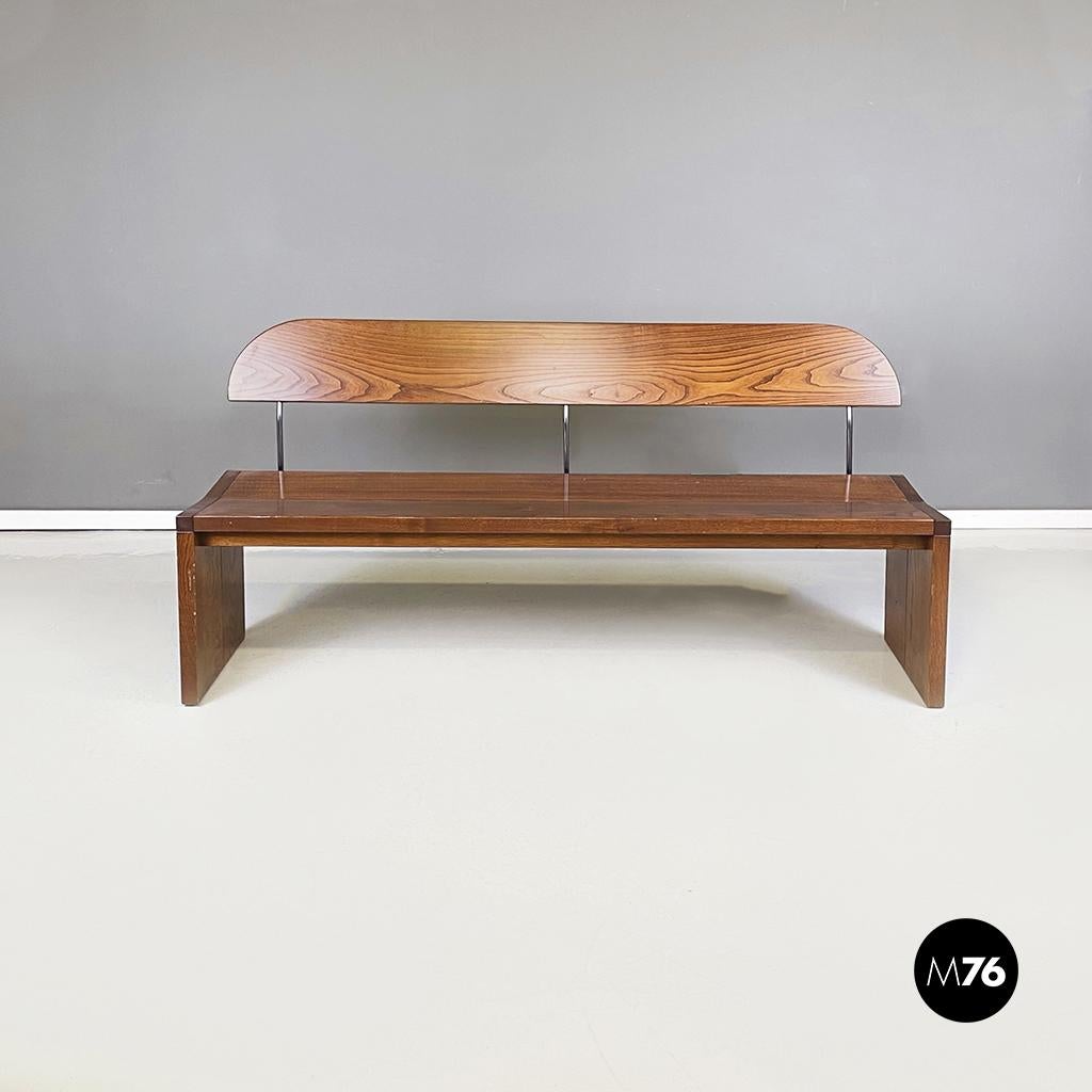 Italy modern chairs, bench and dining table in solid wood, 1980s
Set composing by 3 chairs, a dining table and a bench, entirely in solid wood. The rectangular seat, both of the chairs and of the bench, is connected to the rounded back thanks to