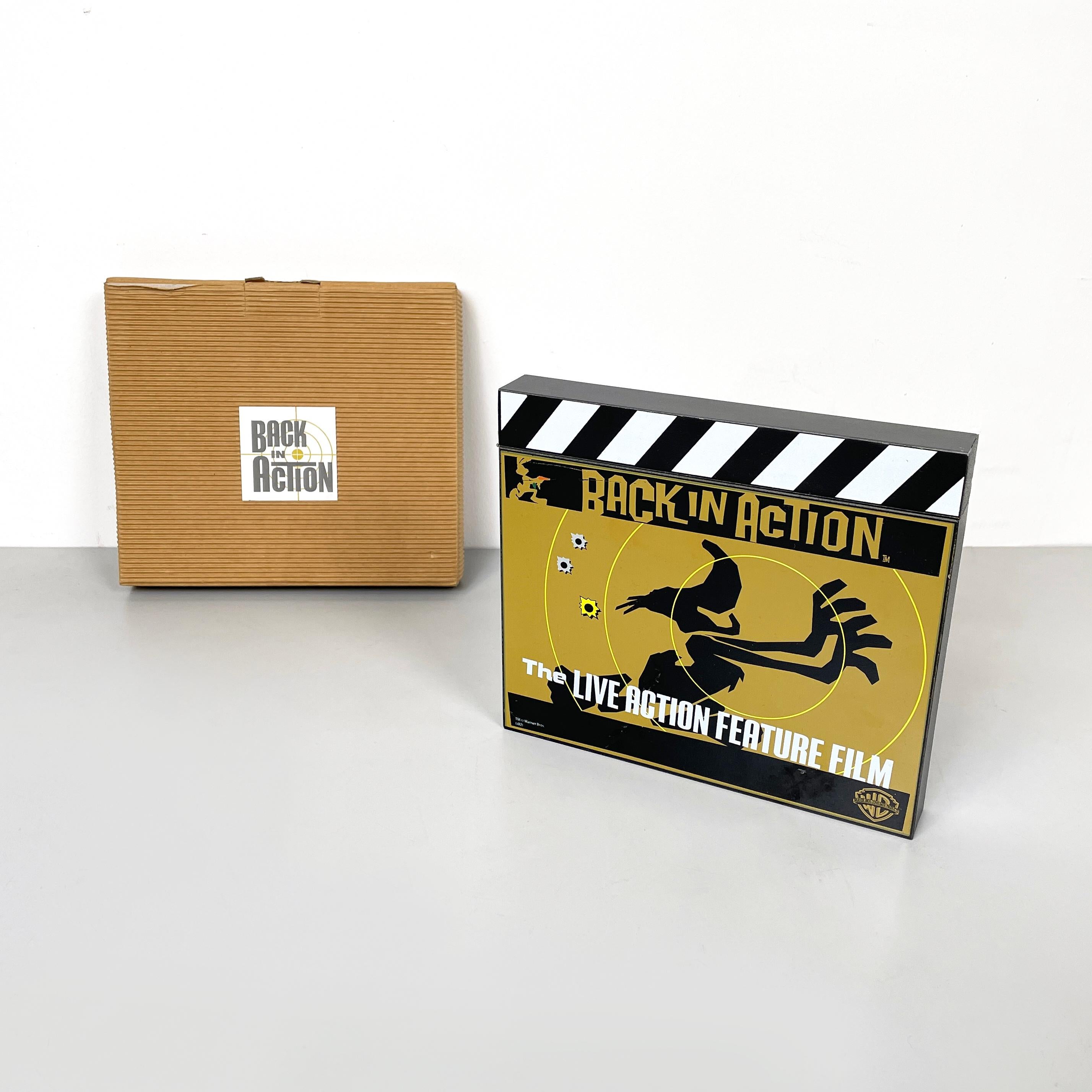 Italy modern Wood clapperboard Looney Tunes: Back in action by Warner Bros Studios, 2003
Wooden clapperboard distributed to promote the cinema release of the film Looney Tunes: Back in action. The movie tablet features Daffy Duck running away in the