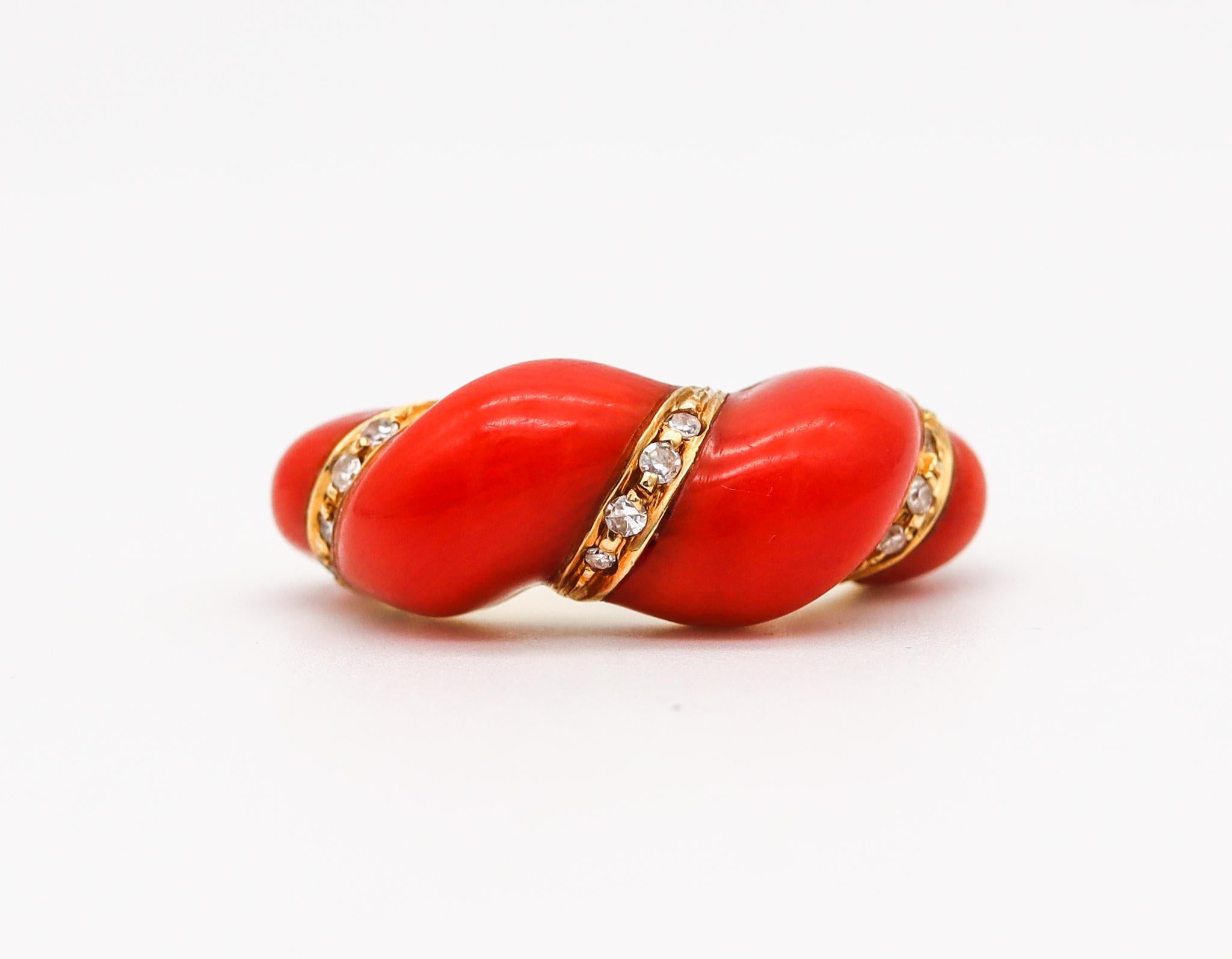 Neapolitan band ring with red coral.

Gorgeous vintage piece made in the portuary city of Napoles in Italy, at the jewelry atelier of Francesco Passaretta back in the 1970. This colorful ring has been crafted in solid yellow gold of 18 karats with