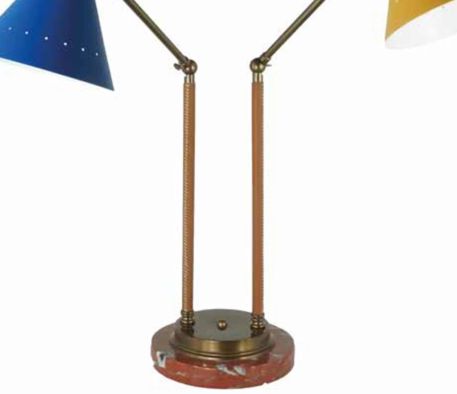 Table lamp in brass with shaft covered by hand sewed genuine cow leather. Double swinging arms and painted metal shades in blue and yellow. Base in red Italian marble. The brass has a burnished finish.

Eu wiring.
Rest of the world wiring
