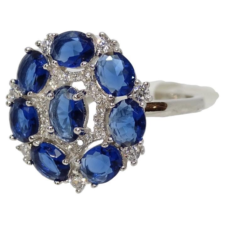 Italy rosette ring, sapphire root and zircons, 925 silver For Sale