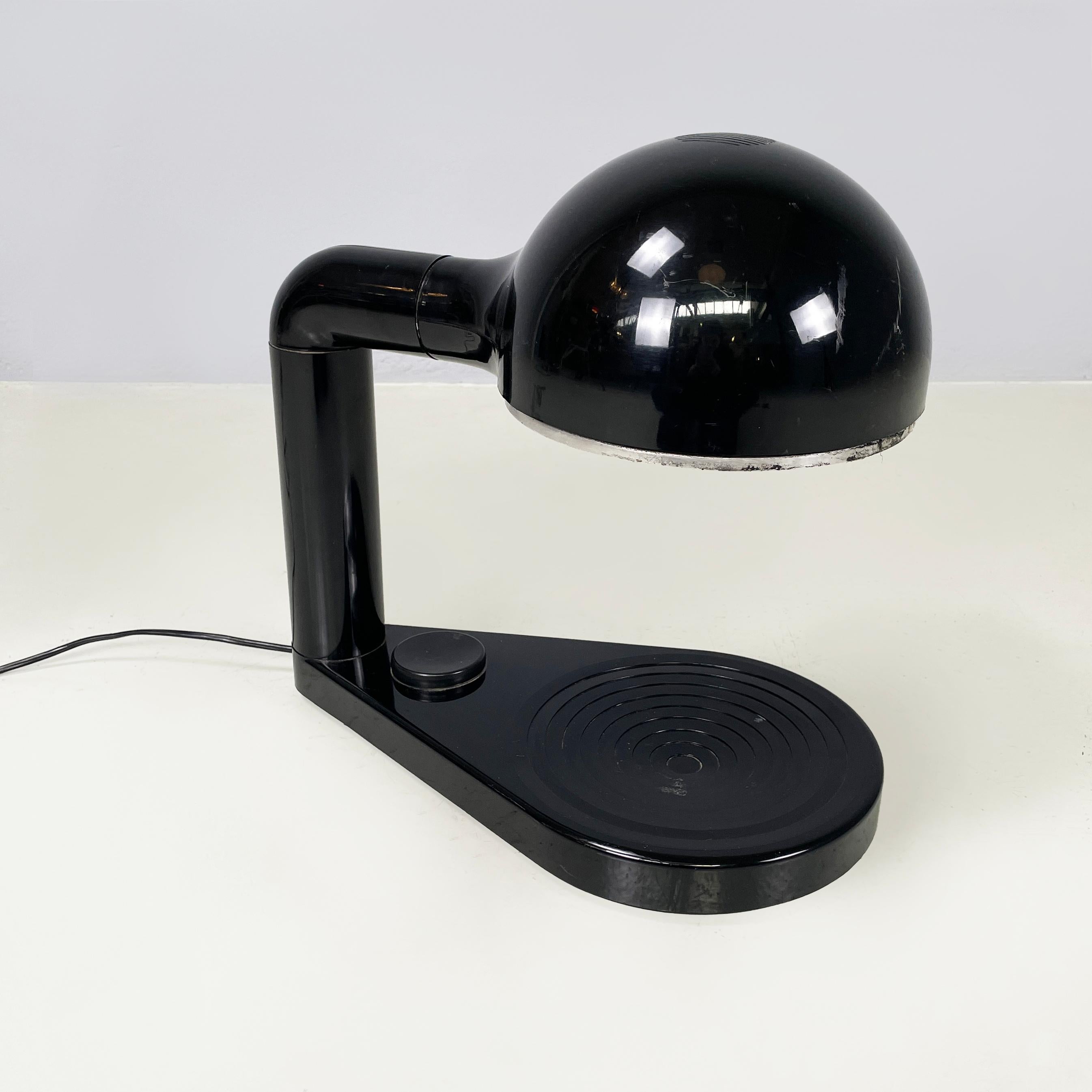 Italian space age Adjustable table lamp Drive by Adalberto Dal Lago for Bieffeplast, 1970s
Vintage table lamp mod. Drive table lamp in black and white plastic. The adjustable diffuser is a hemisphere in plastic, black on the outside and white on the