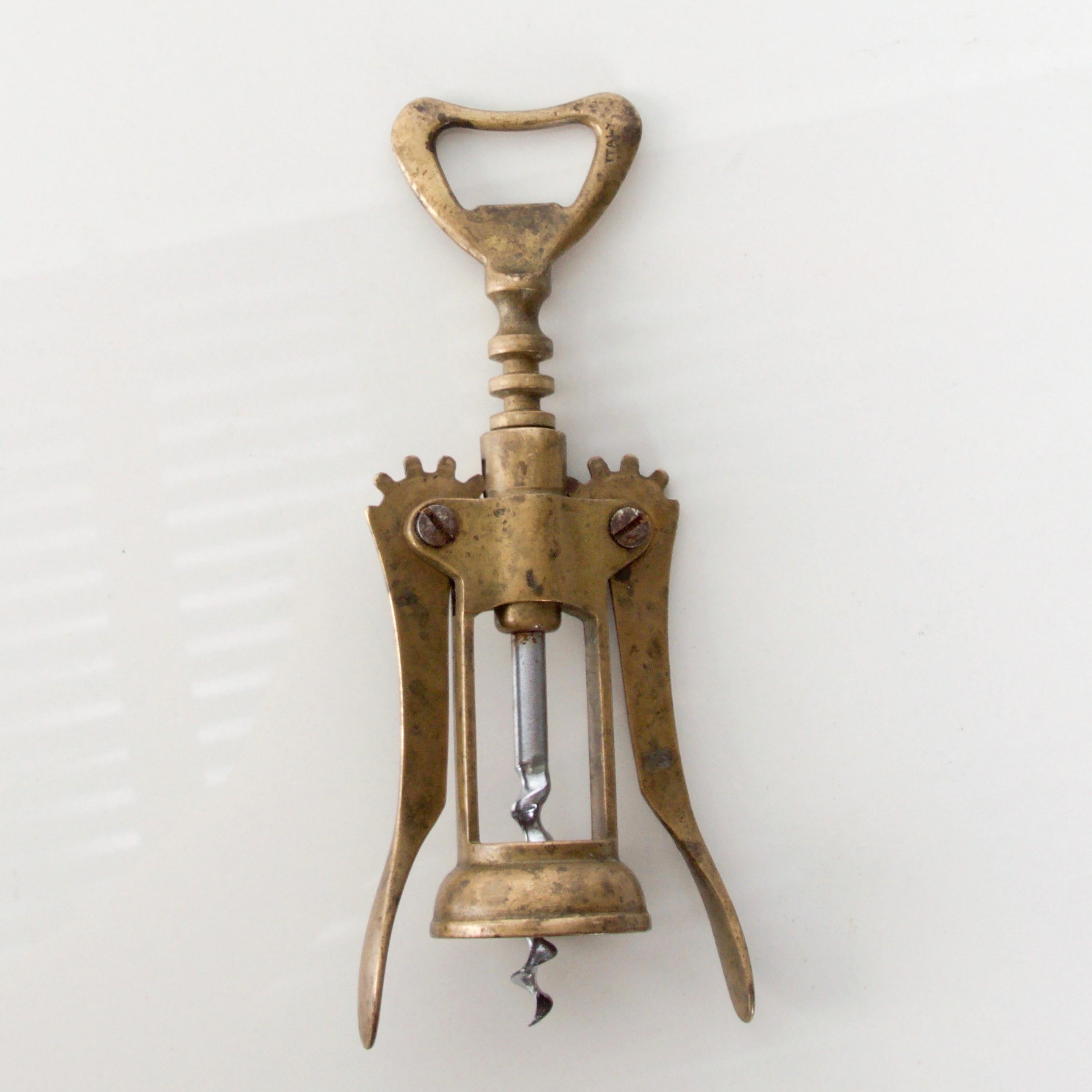 Stylish brass bottle opener wine corkscrew opener 1960s vintage modern from Italy
Measures: 6 1/2 H x 8 W (open), 2.25 W (closed) x 1.5 D inches
Brass with chrome-plated steel. Stamped ITALY.
Original vintage patina. Preowned and unrestored