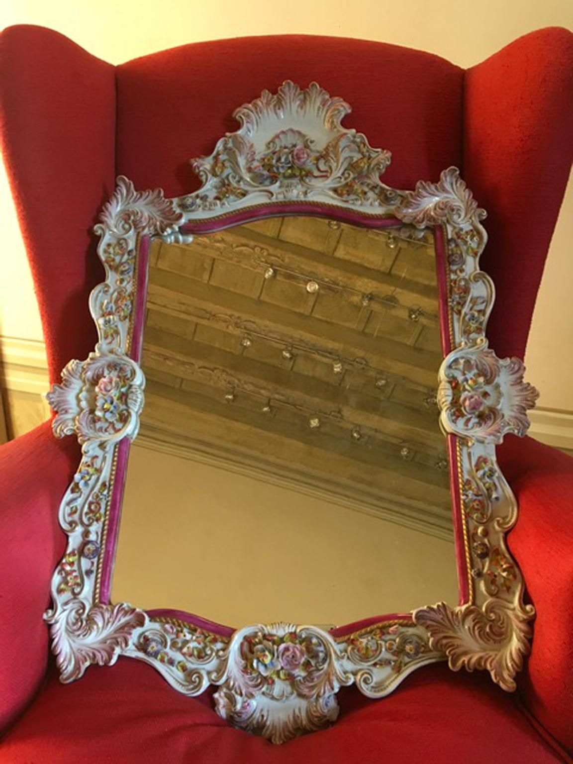 This mirror is an example of the ability of Italian masters of the past in hand working.
The flowers are elegant and fine and the mirror has harmonious and balanced colors.
A agreeable piece to insert in minimal ambience or maximal one, to decor