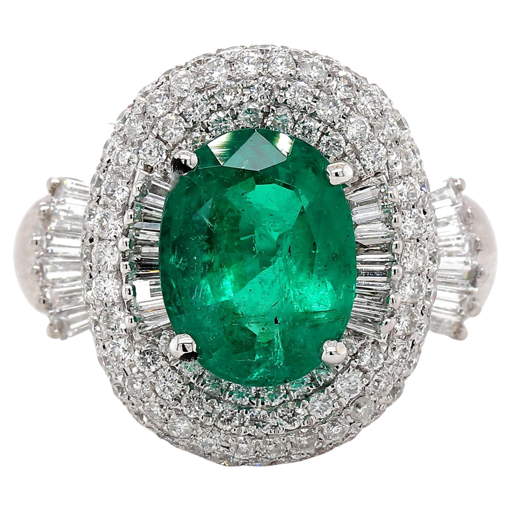 Fine 2.40 Carat Oval Emerald and Diamond Ring For Sale