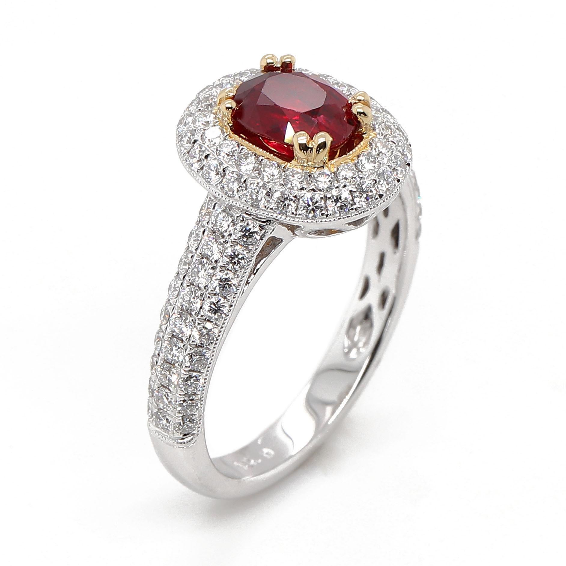 One GIA certified vv fine oval Ruby of about 1.03 carats surrounded by 98 round brilliant cut Diamonds of about 0.85 carats with a clarity of SI and color G. All stones are set in 18k 2 tone gold. The total weight of the ring is approximately 4.97