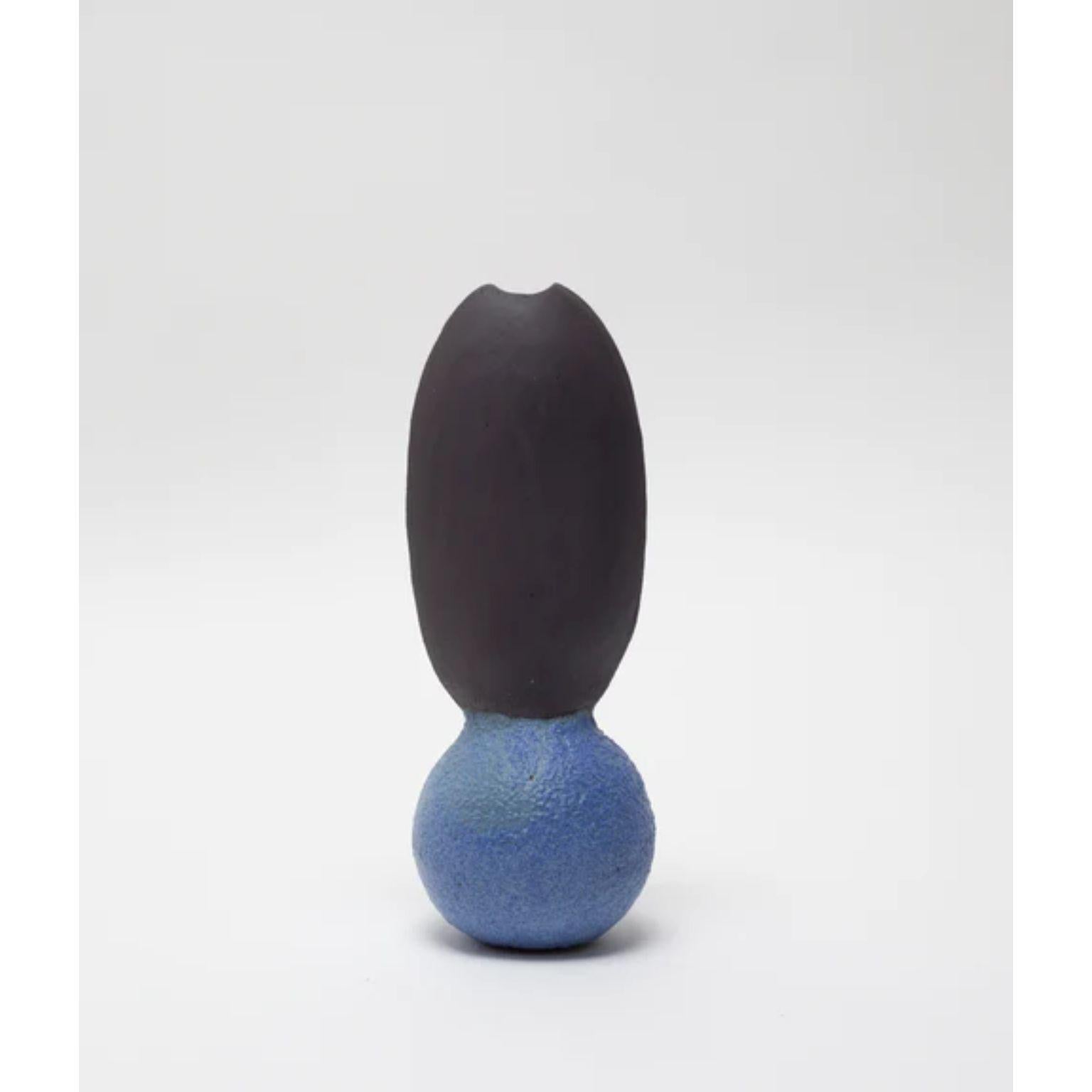 Itera Black And Blue Single Vase by Ia Kutateladze
One Of  A Kind.
Dimensions: D 10 x W 10 x H 27 cm.
Materials: Black and blue clay.

Handcrafted sculptural ceramic vase in black. Please note coloration may vary. Each piece is one of a kind, due to
