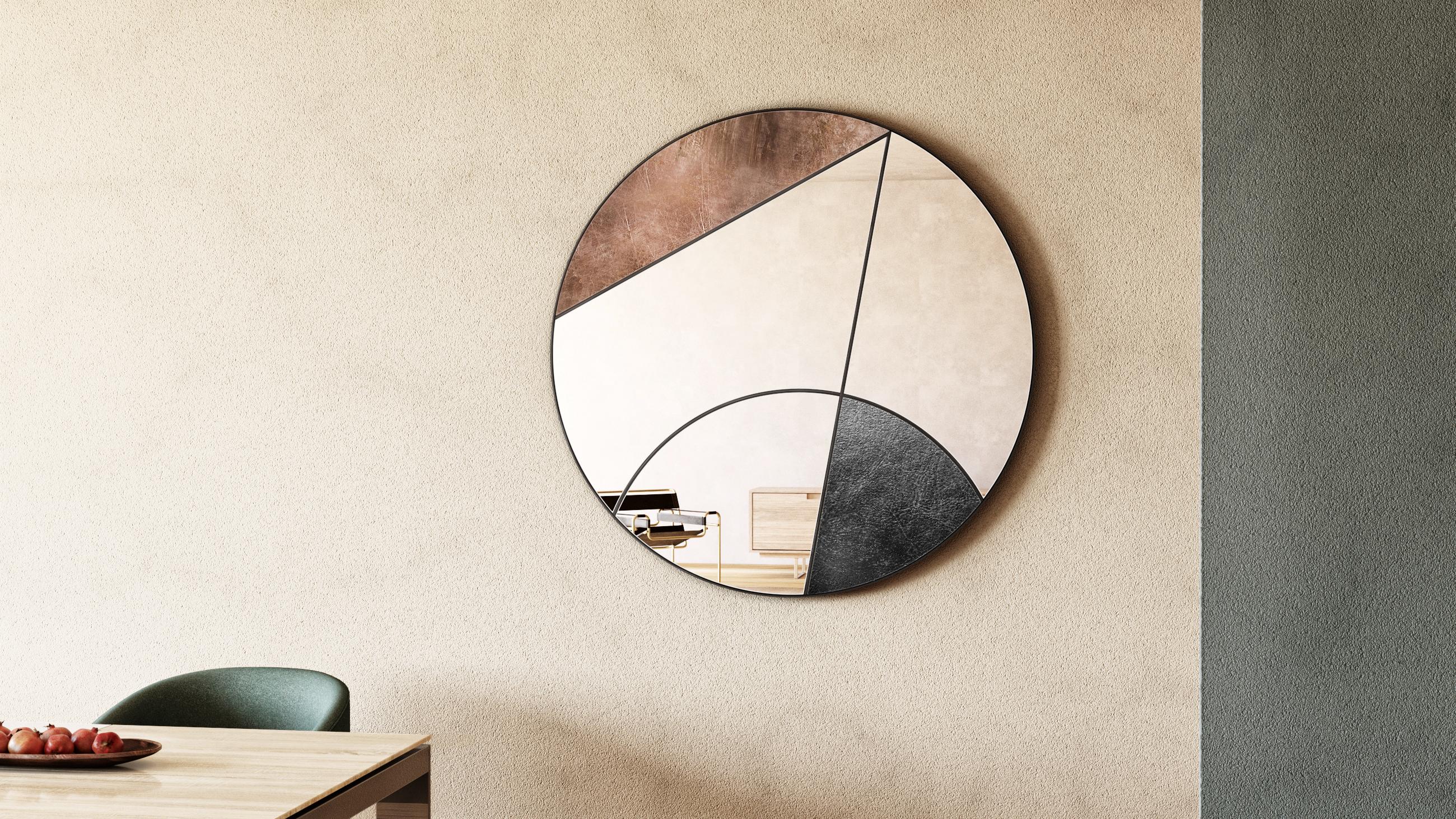 Itinera Eclipsis III 80 Wall Mirror by Atlas Project
Dimensions: D 3/5 x Ø 80 cm. 
Materials: Black powder painted iron, copper, black leather, mirror, and wood.

Available in different finishes and sizes. Please contact us.

ECLIPSIS
The