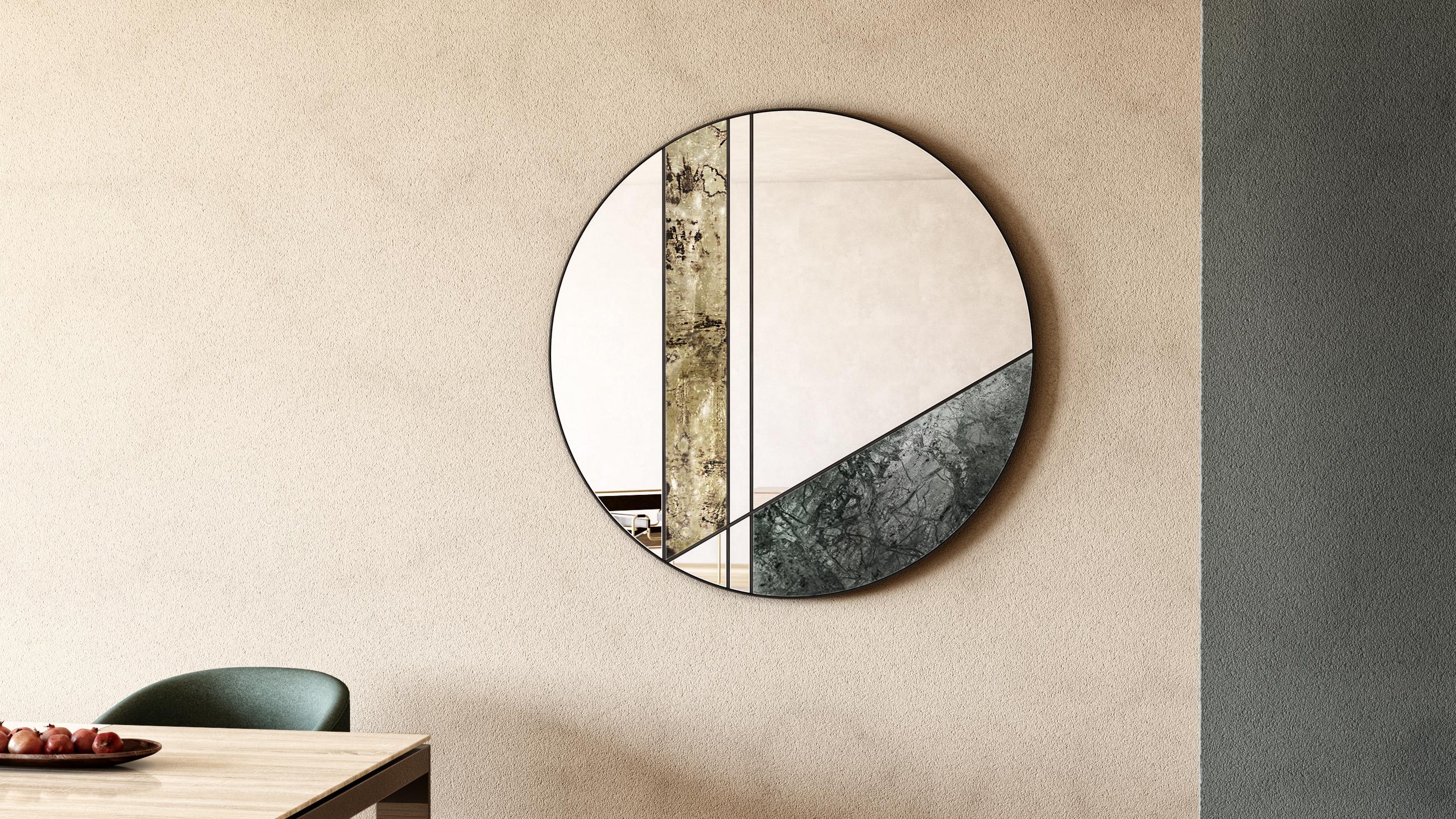 Miroir mural Itinera Lamina I 80 par Atlas Project
Dimensions : D 3/5 x Ø 80 cm. 
MATERIAL : Fer peint à la poudre noire, marbre vert du Guatemala, laiton antique, miroir et bois.

Disponible en différentes finitions et tailles. Veuillez nous