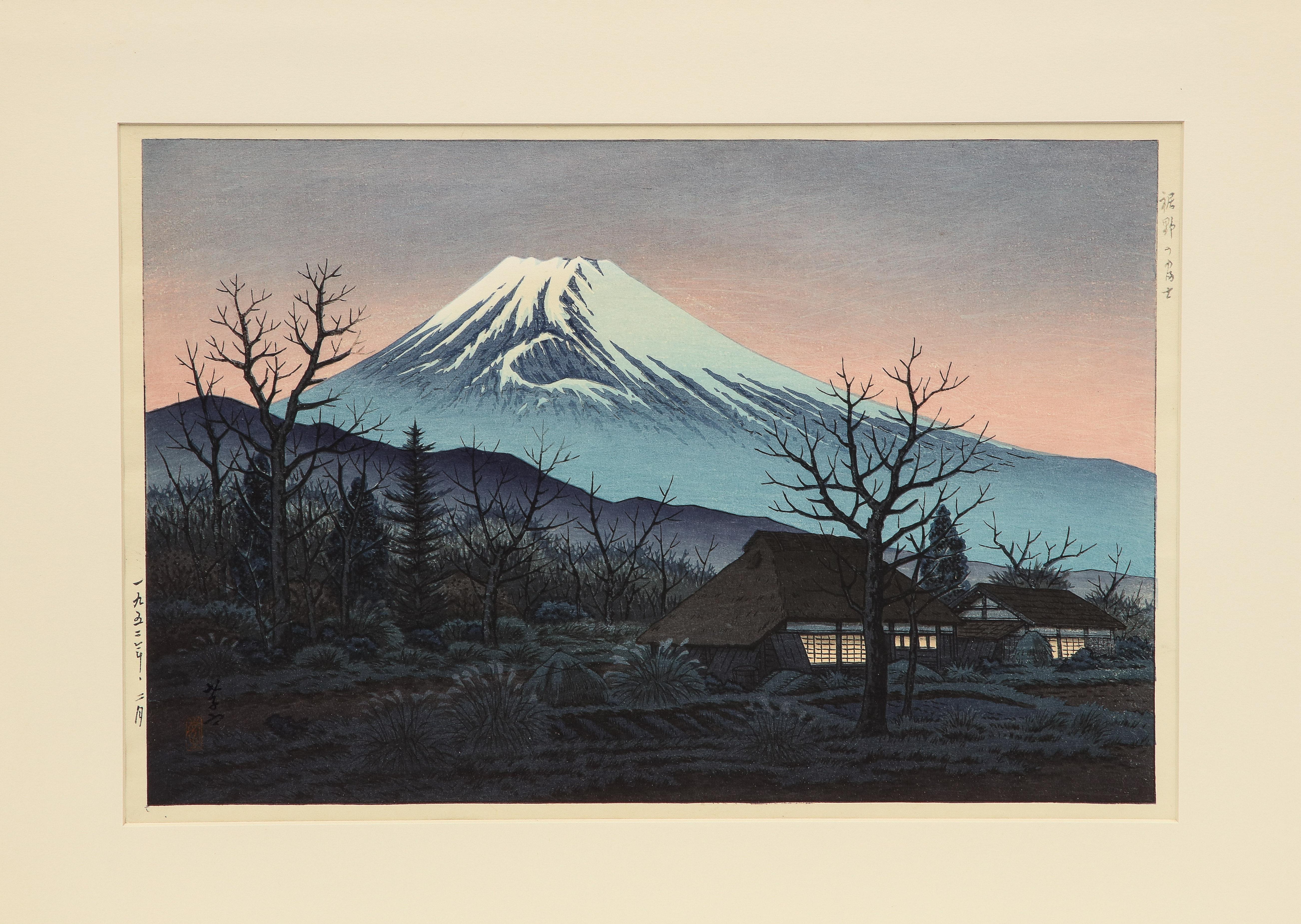 Ito Takashi Landscape Woodblock: Mt. Fuji from Susono. Beautiful Japanese woodblock with good colors; under glass with 1960s era matting and framing. The black frame, with gold trim, shows minor wear. Mat opening Size: 10 inches x 15 inches. The