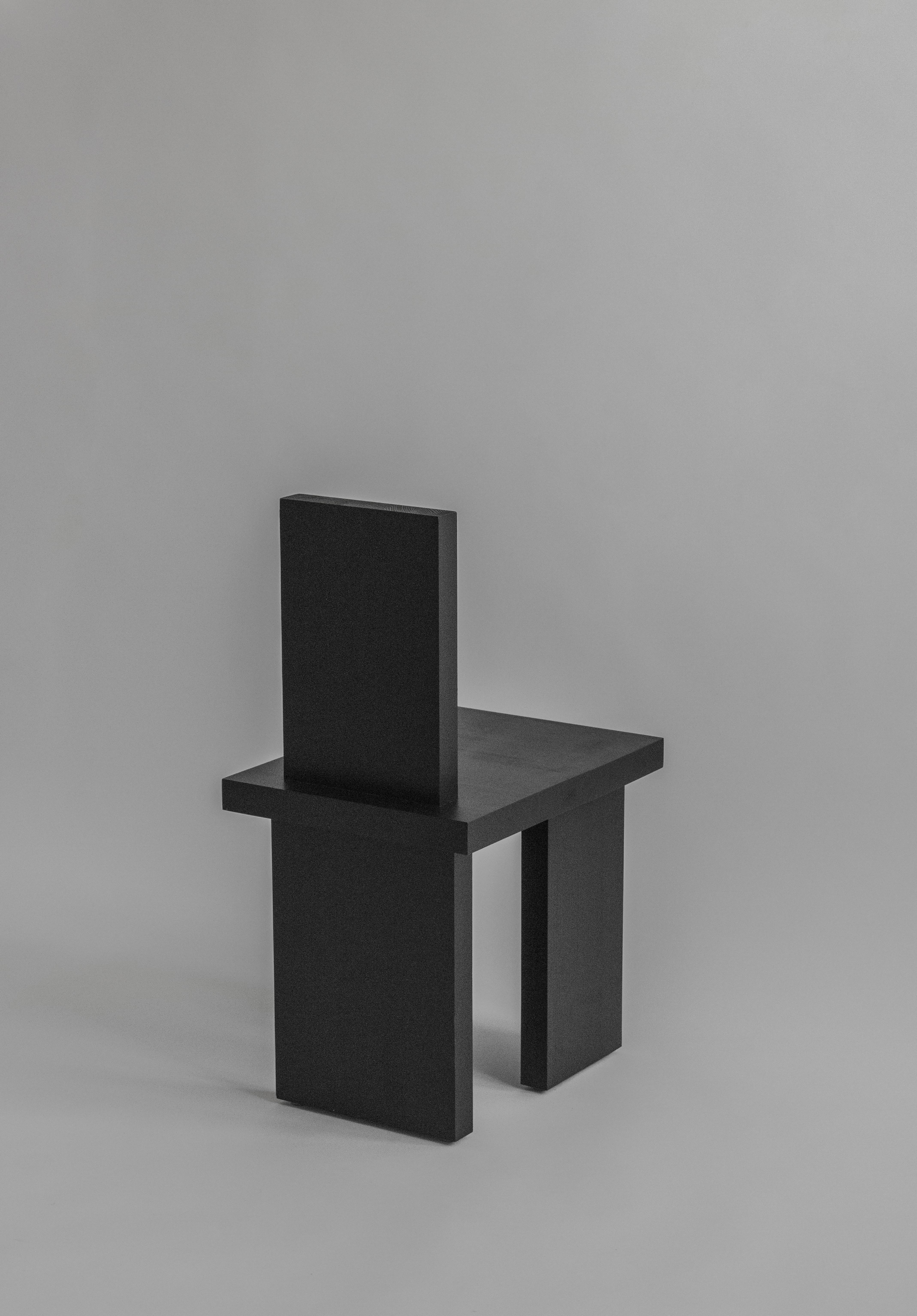 ItooRaba dining chair by Sizar Alexis
Signed
Dimensions: length 36 x width 47 x height 77cm
Seat height 42cm

Comes in stained black, white and natural pine

A furniture series that embraces geometrical shapes. Inspired by the passion for Brutalism,