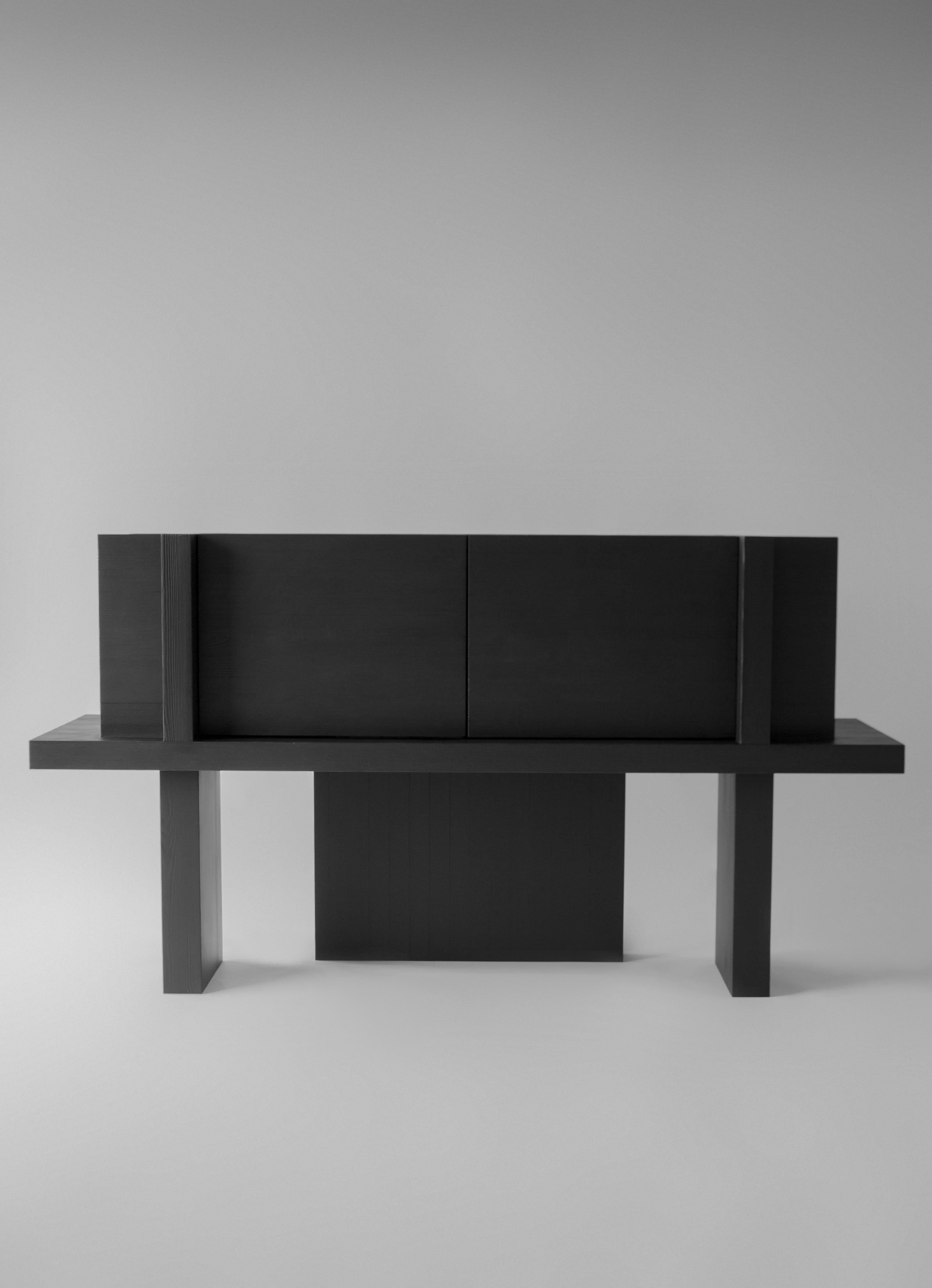ITOORABA Sculpted Sideboard in Wood by Sizar Alexis
Limited Edition of 12 pieces
Dimensions: L170cm D50cm H85cm
Material:
Natural solid fine Swedish pine
Burned and oiled black solid fine Swedish pine

ITOORABA embraces the austere geometry inherent