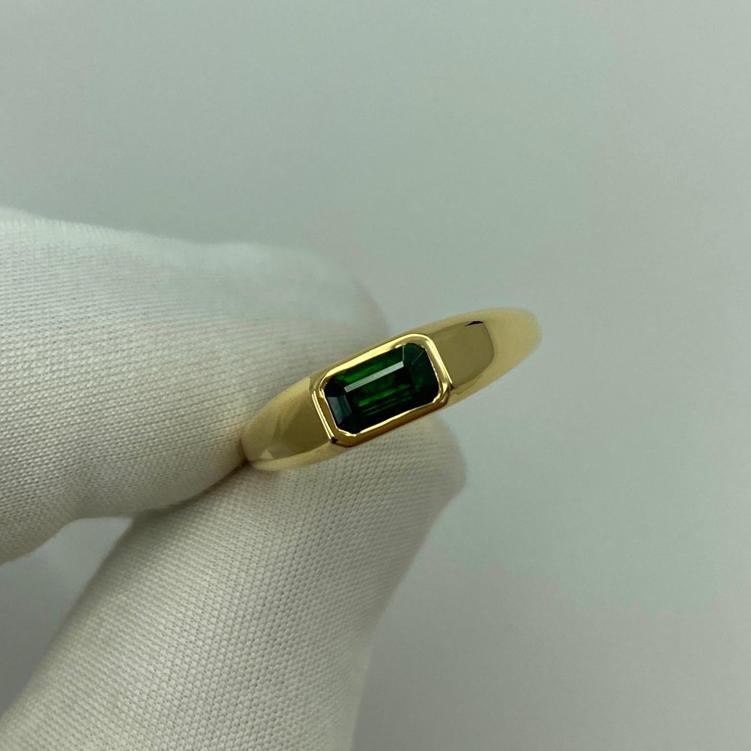 ITSIT Designed Vivid Green Tsavorite Garnet 18k Yellow Gold Ring.

Stunning 0.75 Carat tsavorite garnet with a beautiful vivid green colour and an excellent emerald cut. Also has very good clarity, rare and top quality stone with only some small
