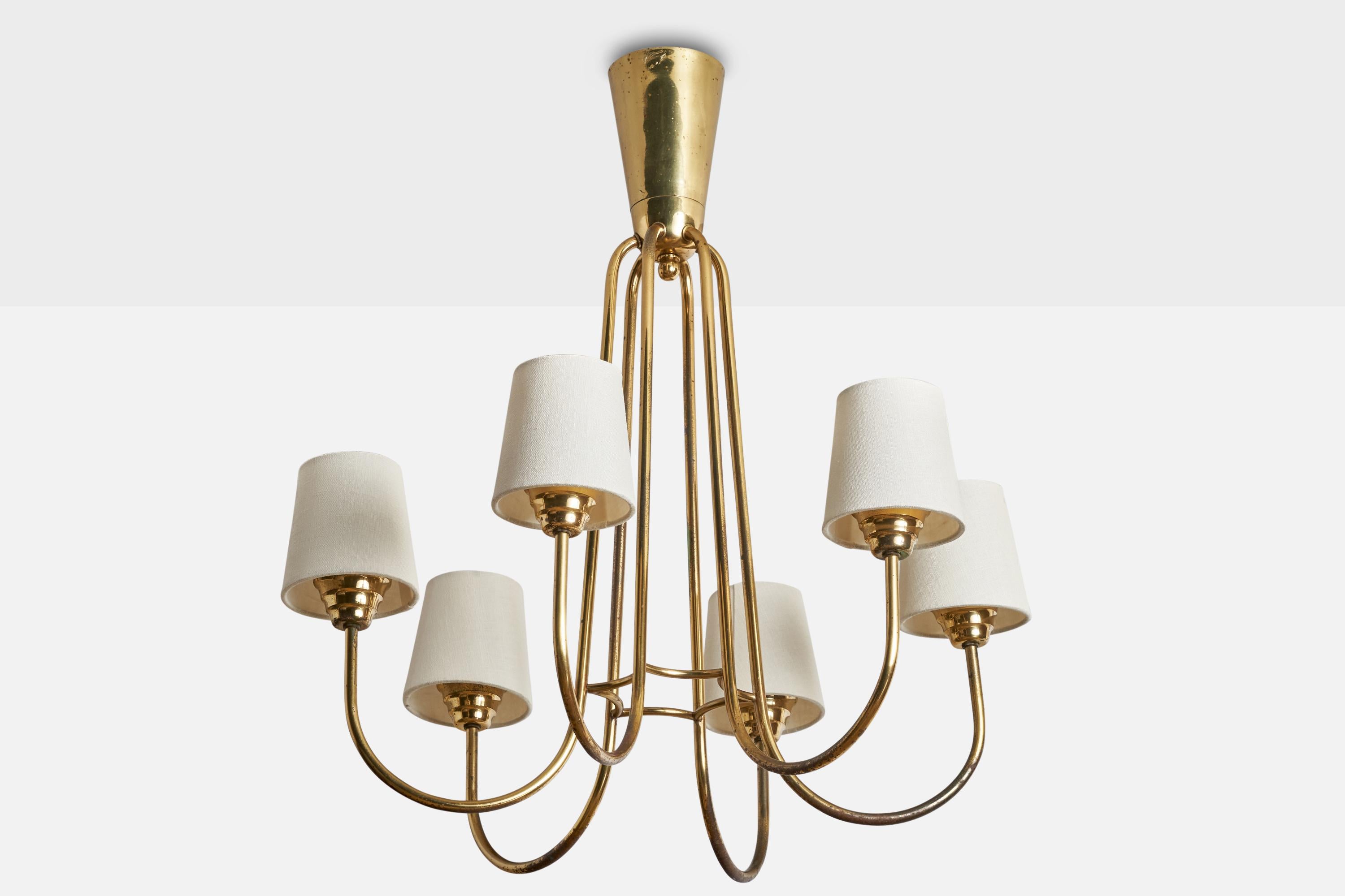 A brass and white fabric chandelier designed and produced by ITSU, Finland, c. 1940s

Dimensions of canopy (inches): 3.75”  H x 4.25” Diameter
Socket takes standard E-26 bulbs. 6 sockets.There is no maximum wattage stated on the fixture. All