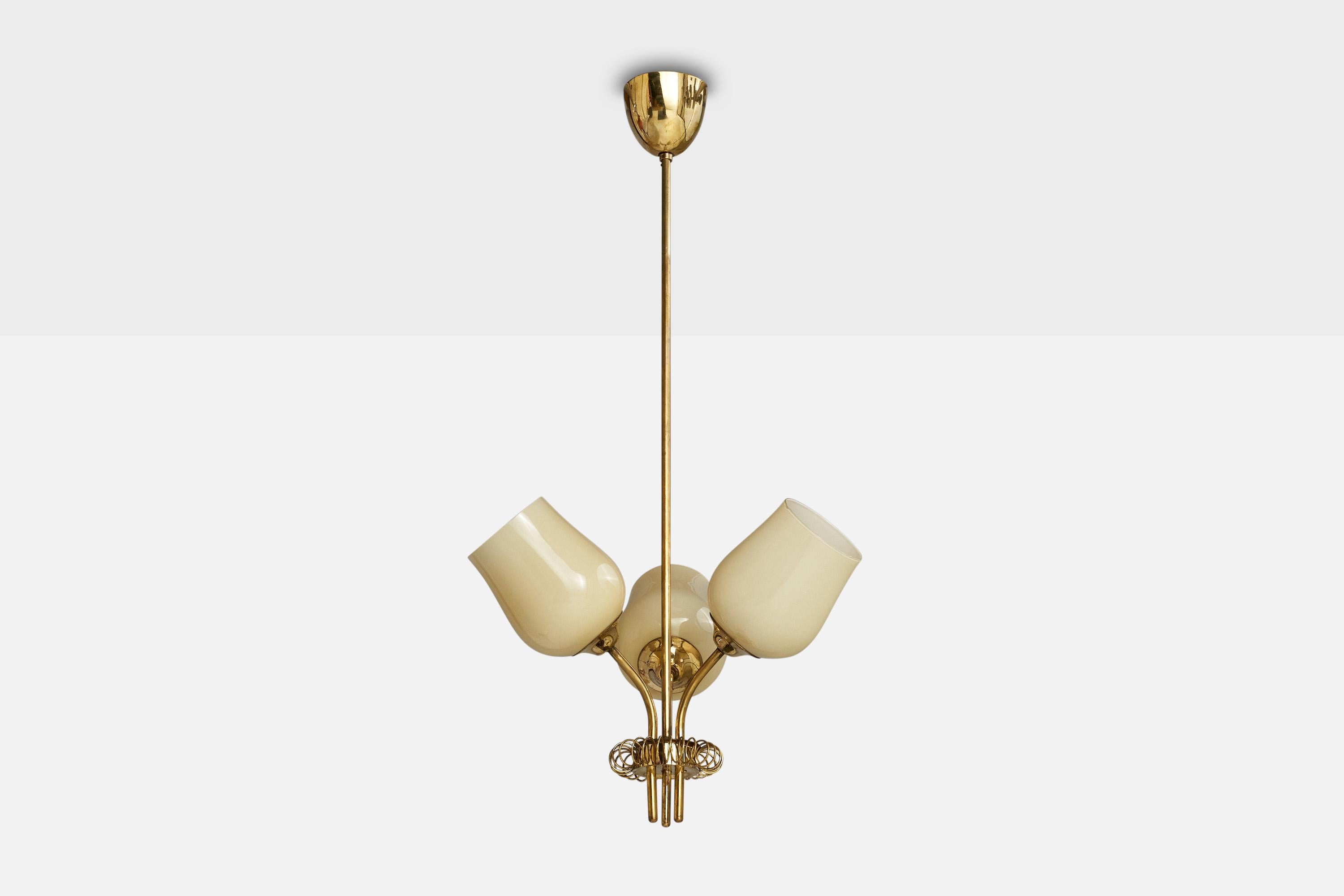 A brass and beige opaline glass chandelier designed and produced by Itsu, Finland, 1940s.

Dimensions of canopy (inches): 3.25” H x 3.75”  Diameter
Socket takes standard E-26 bulbs. 3 sockets.There is no maximum wattage stated on the fixture. All