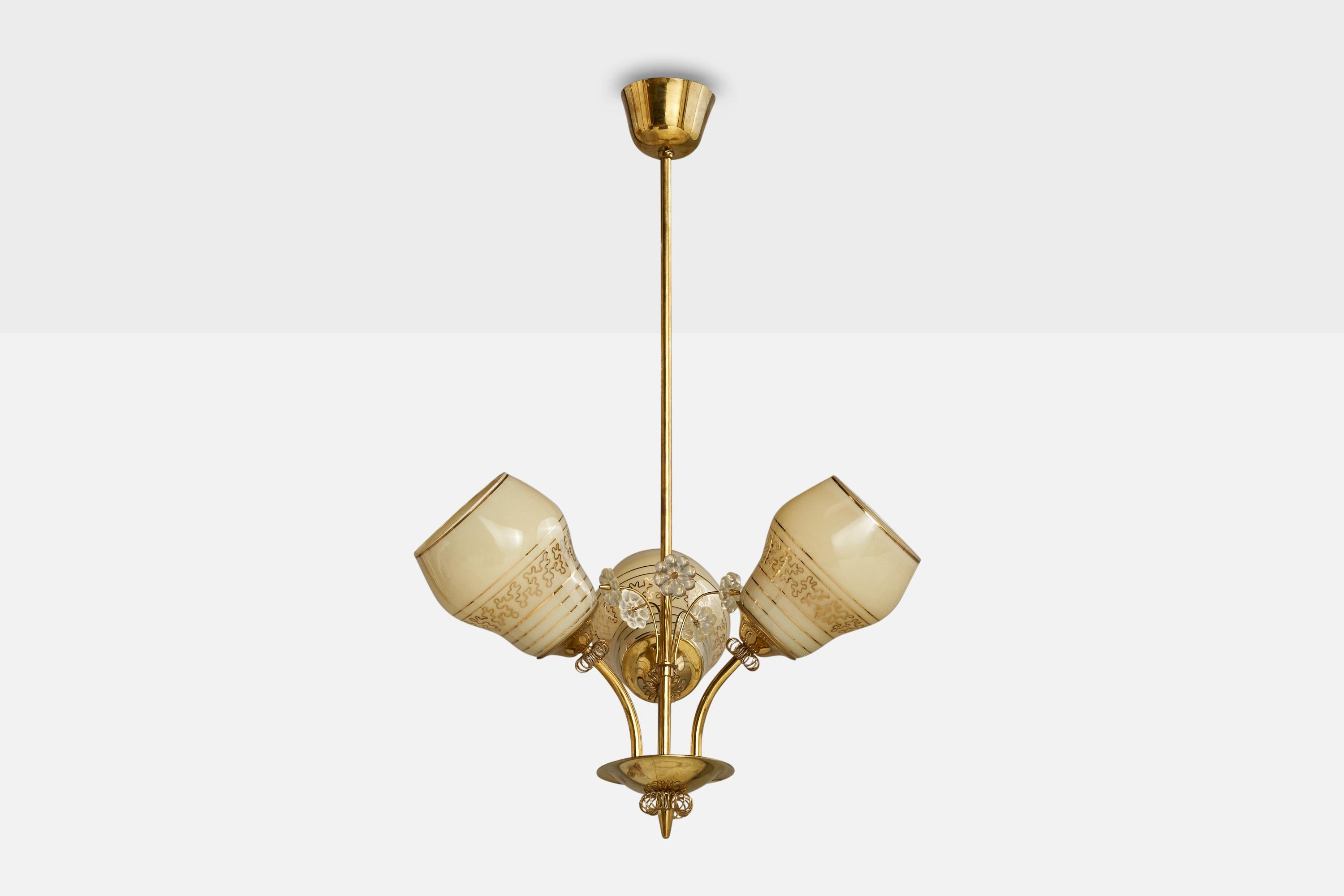 A brass, glass and beige opaline glass chandelier designed and produced by ITSU, Finland, 1940s.

Dimensions of canopy (inches): 2”  H x 3.5”  Diameter
Socket takes standard E-26 bulbs. 3 sockets.There is no maximum wattage stated on the fixture.