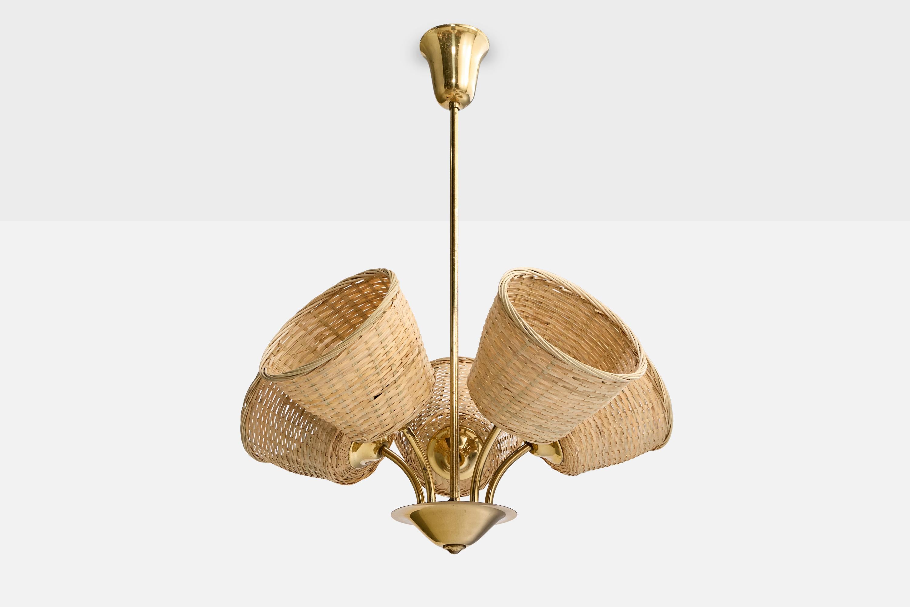 Araña de latón y ratán fabricada por Itsu, Finlandia, c. 1950.

Dimensiones totales (pulgadas): 26,5 
