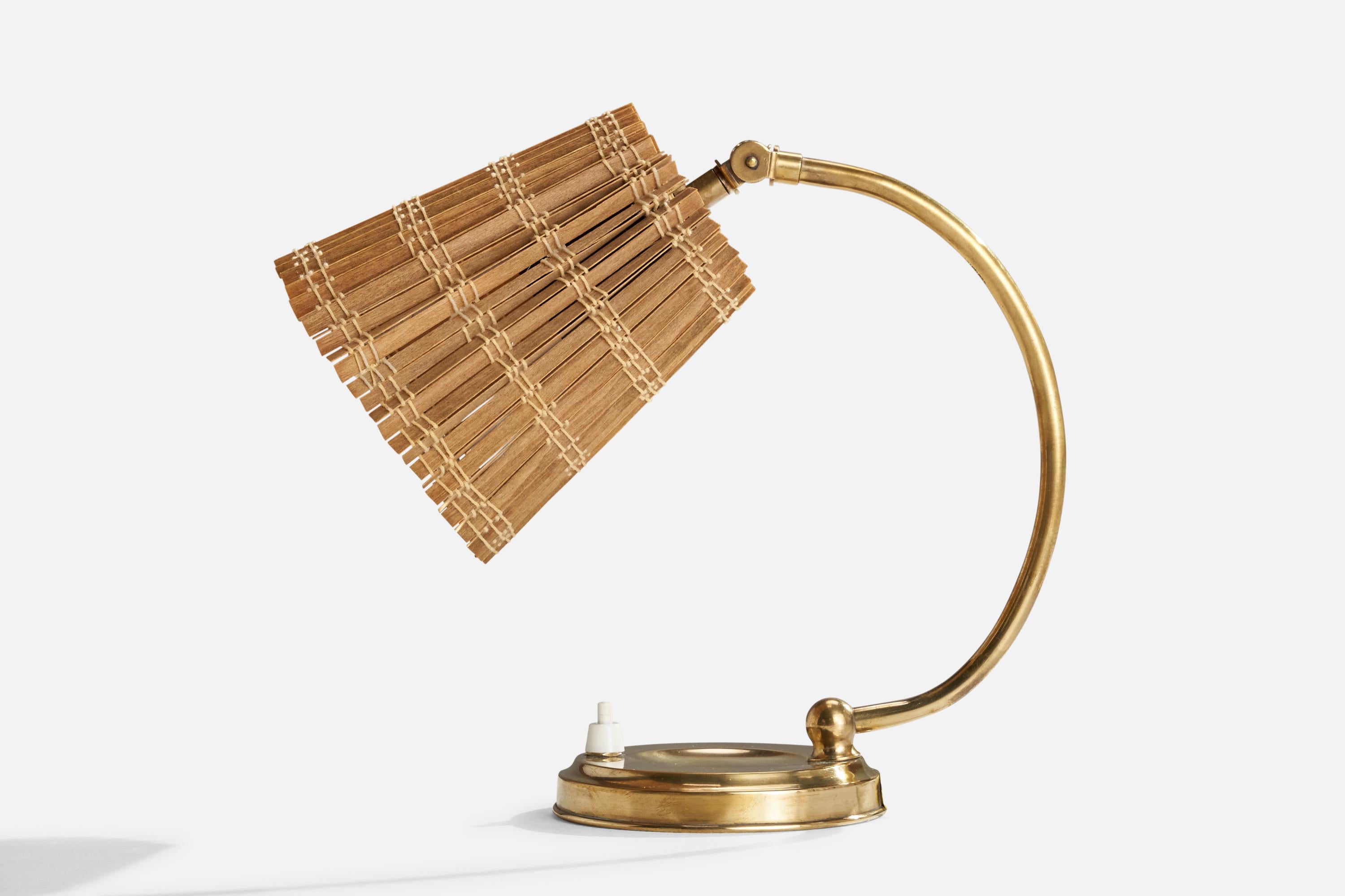 Ein Paar Tischlampen aus Messing und Schilfrohr, hergestellt von Itsu, Finnland, 1950er Jahre.

Gesamtabmessungen (Zoll): 10