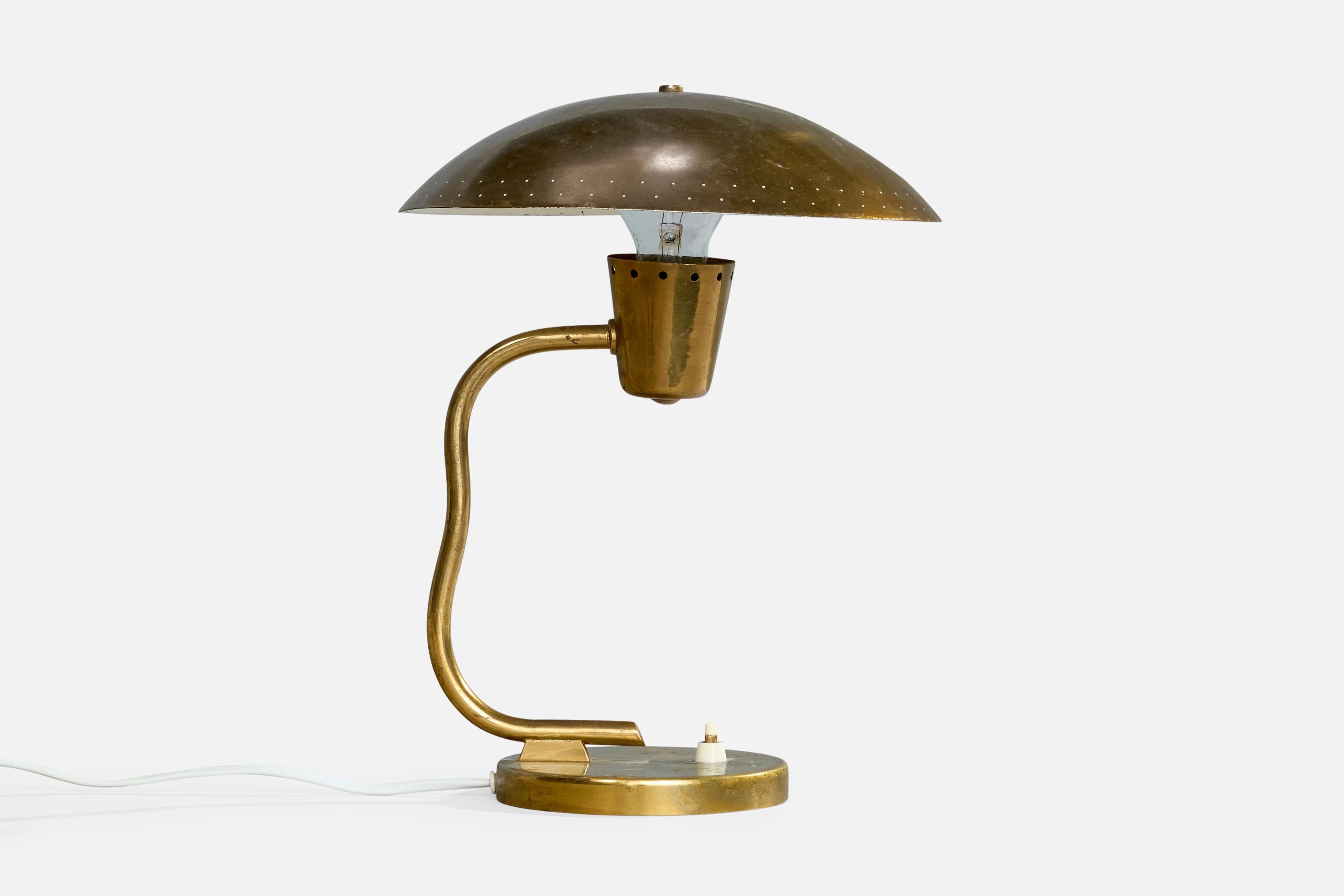 A brass table lamp produced by Itsu, Finland, c. 1950s.

Dimensions of Lamp with Shade (inches): 12.5“ H x 10.75“ Diameter

Bulb Specifications: E-26 STD

Number of Sockets (per fixture): 1

All lighting will be converted for US usage. We are unable