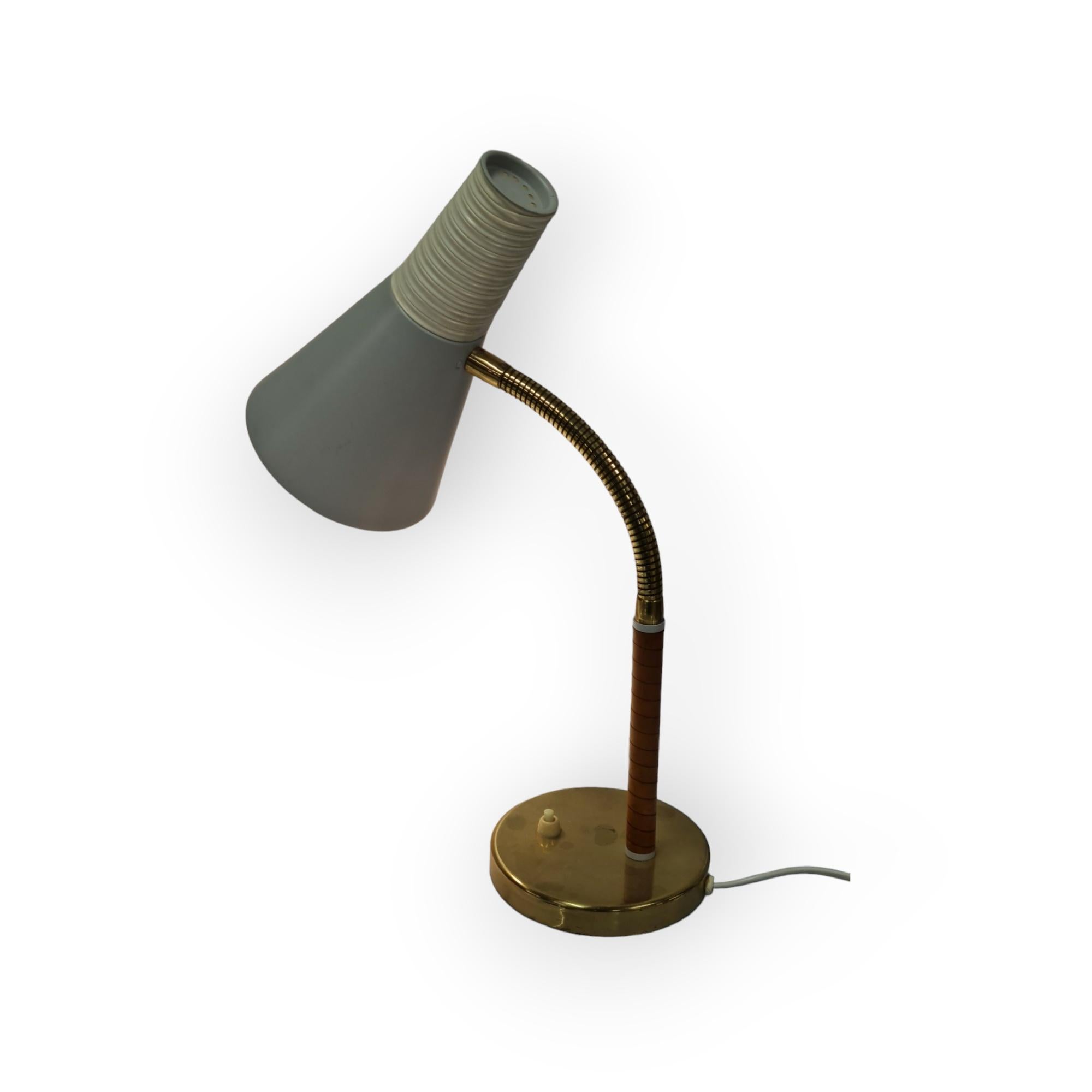This table lamp is light and smart looking and in addition to the high quality, has a very interesting and somewhat naïve, almost cartoonish look that makes it more so interesting and highly collectable. 
Also, the design combines a wide range of