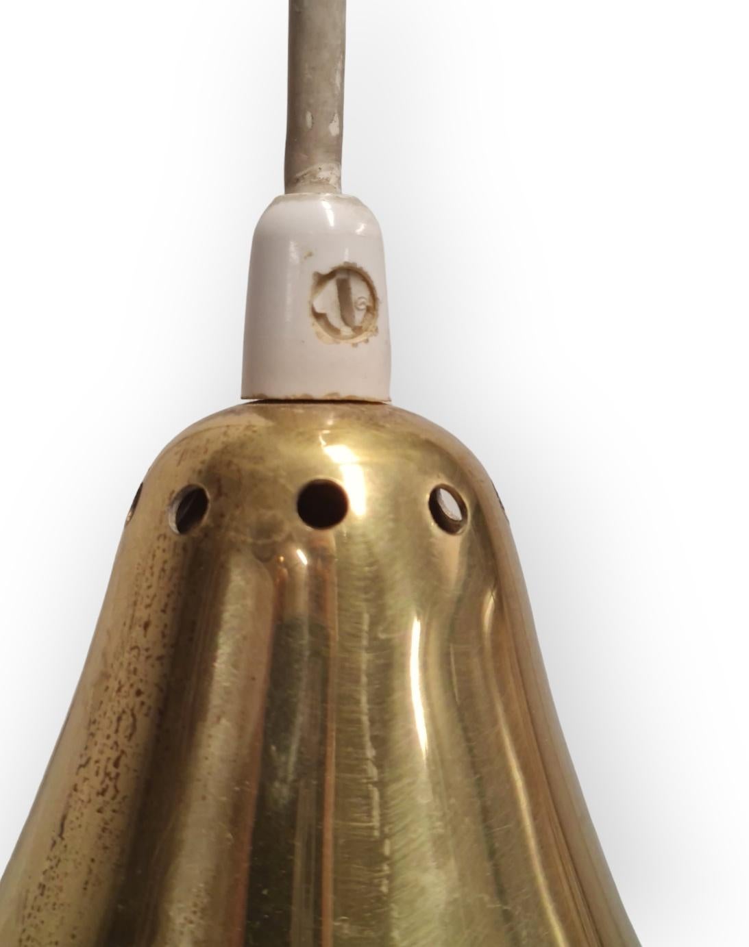 Finlandais Applique télescopique modèle AO 1 en laiton perforé, Itsu 1950s en vente