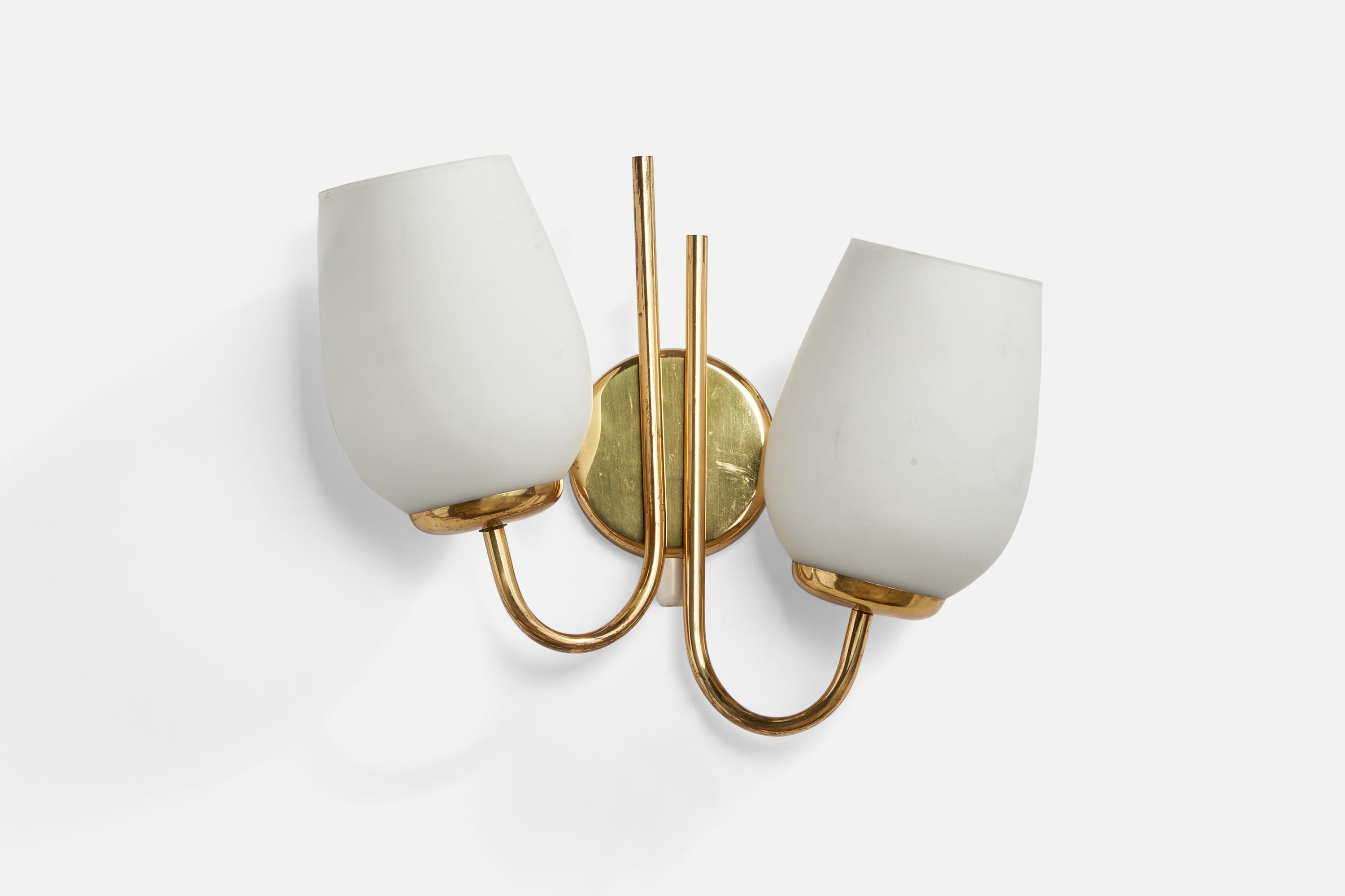 A two-armed brass and opaline glass wall light designed and produced by Itsu, Finland, 1940s.

Overall Dimensions (inches): 10.5” H x 11.75” W x 5.25” D
Back Plate Dimensions (inches): 3.8” Diameter x 0.75” Depth
Bulb Specifications: E-26