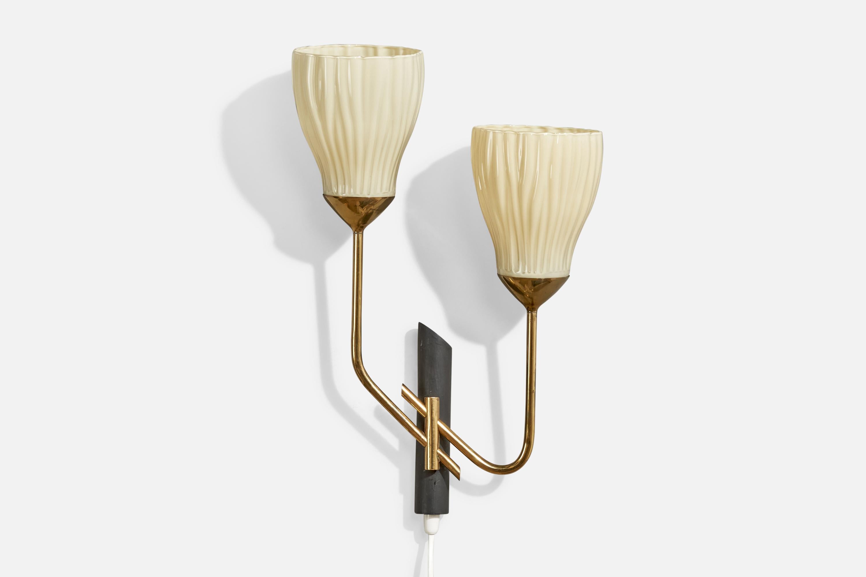 A brass, black-lacquered metal and off-white opaline glass wall light produced by Itsu OY, Finland, c. 1950s.

Overall Dimensions (inches):  18.625” H x  12” W x  4.75” D

Back Plate Dimensions (Inches):  7.5” H x 1.375” W x 1.25” D

Bulb